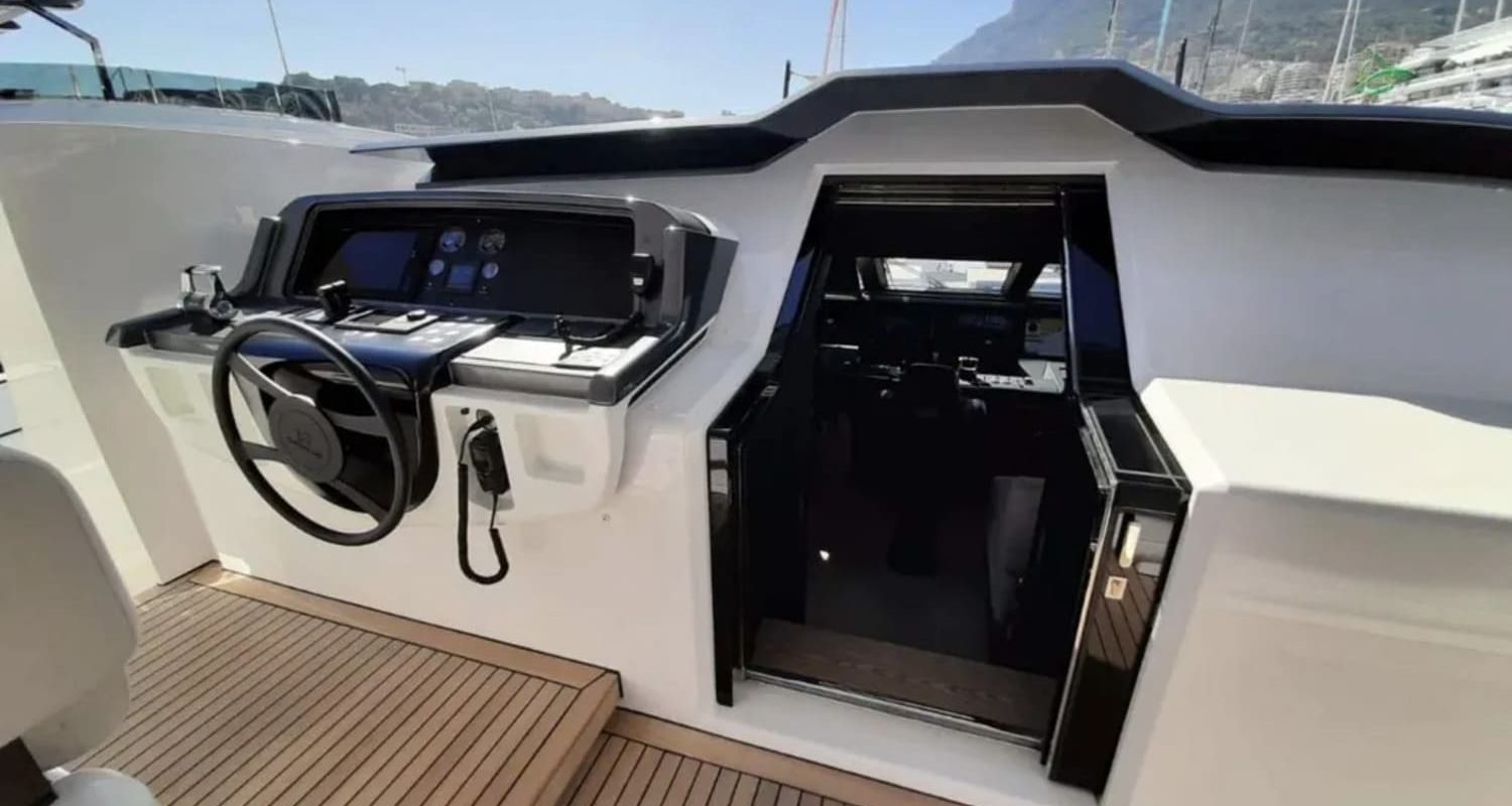 Close-up of the advanced control panel inside the 106' CUSTOM LINE yacht.