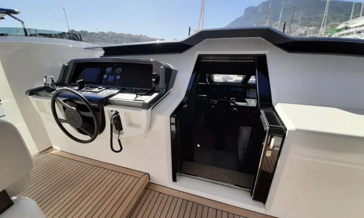 Close-up of the advanced control panel inside the 106' CUSTOM LINE yacht.