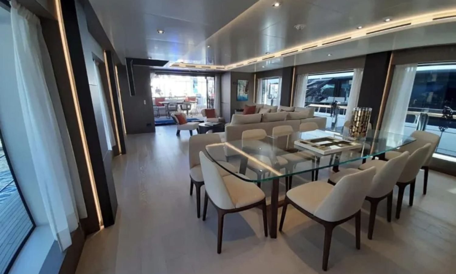 Dining area inside the 106' CUSTOM LINE yacht, designed for sophisticated meals.