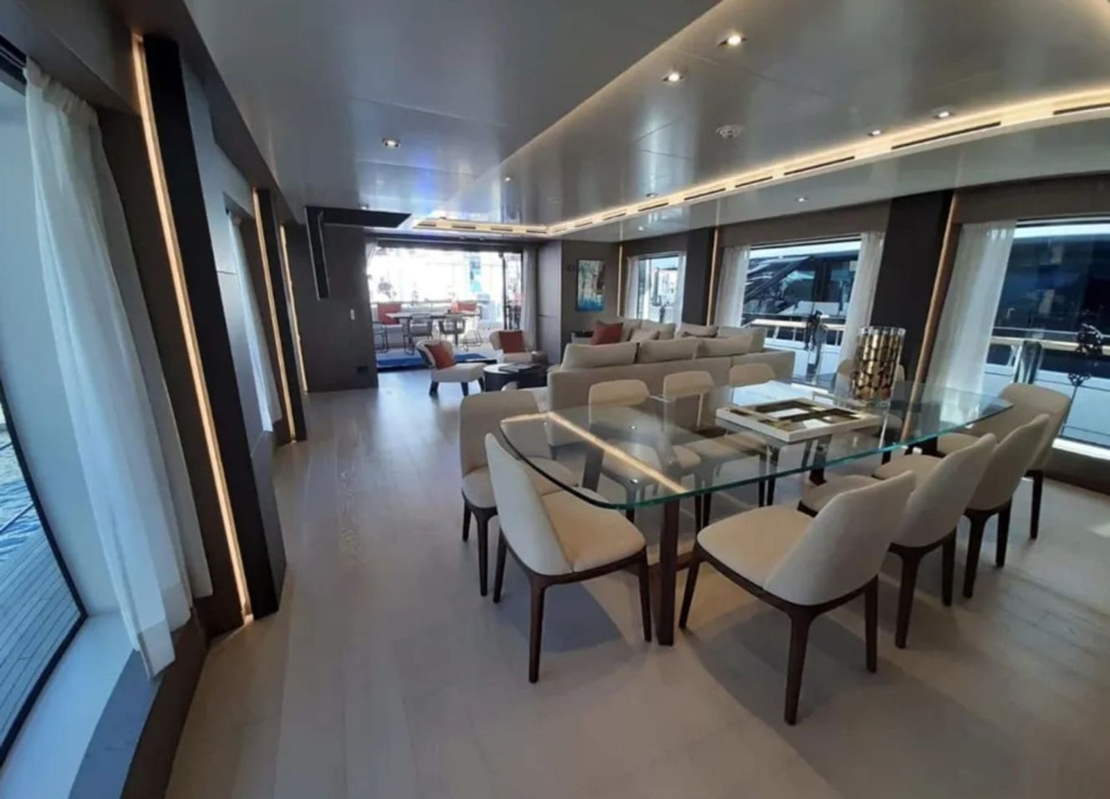 Dining area inside the 106' CUSTOM LINE yacht, designed for sophisticated meals.