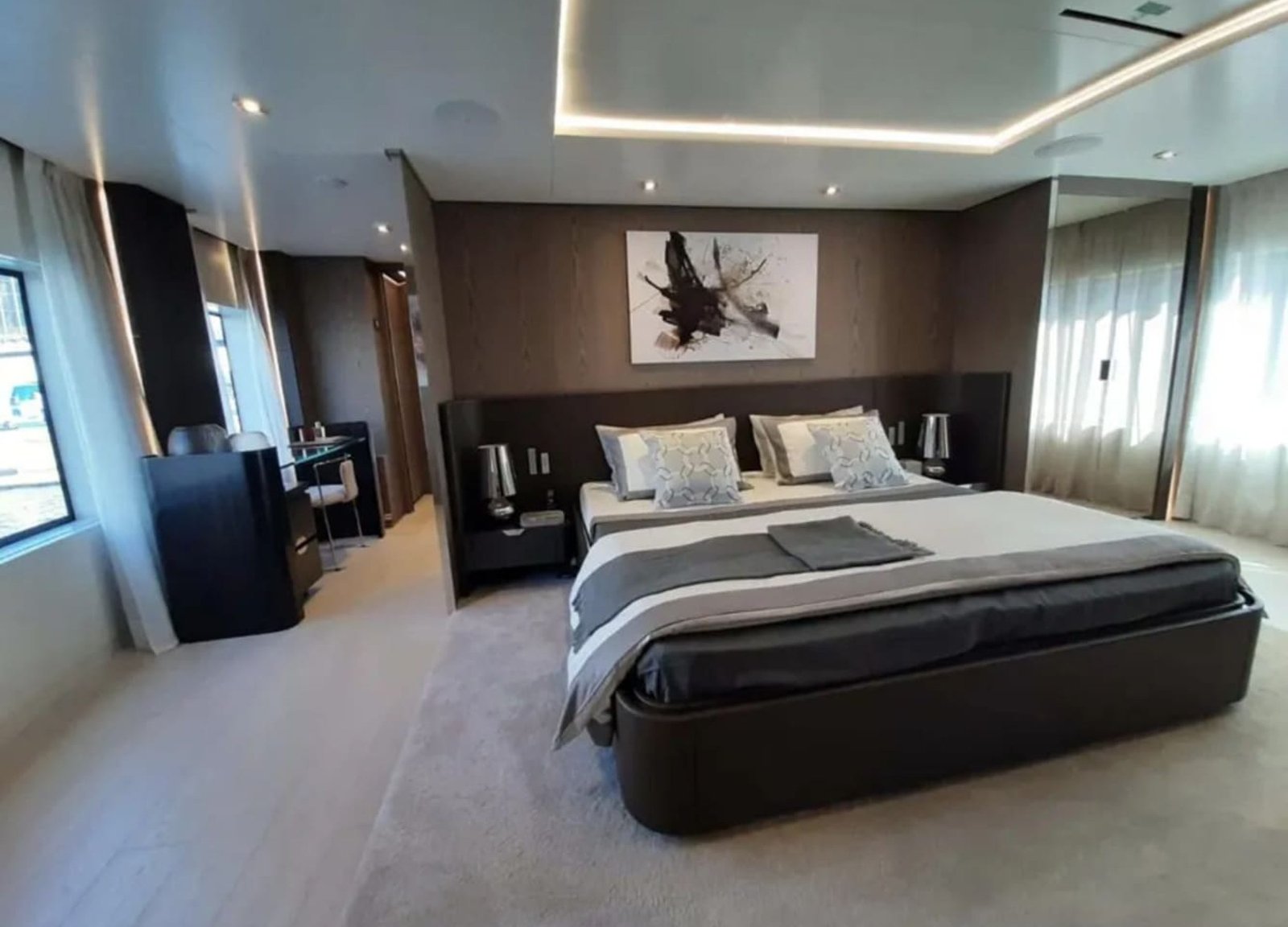 Master bedroom aboard the 106' CUSTOM LINE yacht, offering ultimate comfort and style.