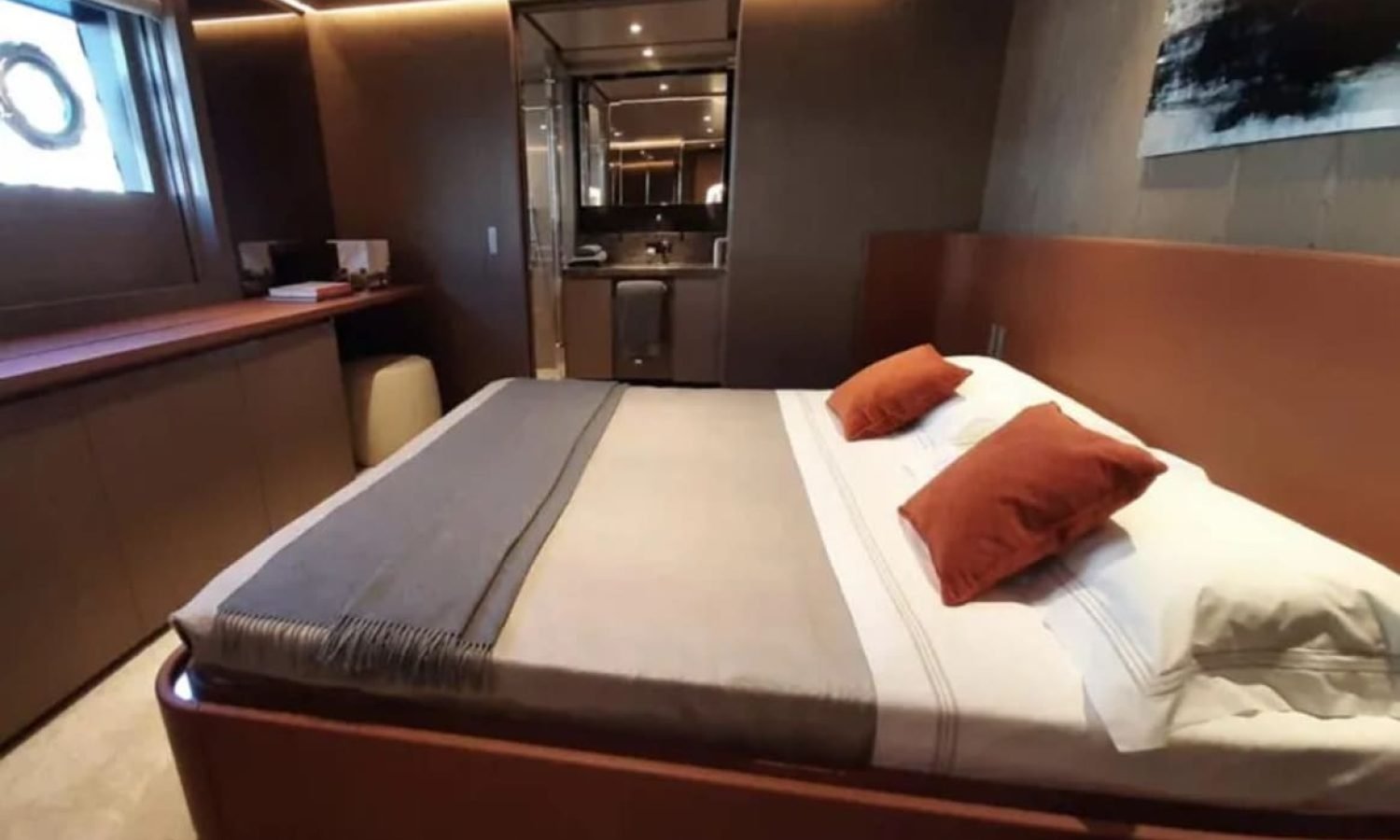 Guest bedroom on the 106' CUSTOM LINE yacht with elegant furnishings.