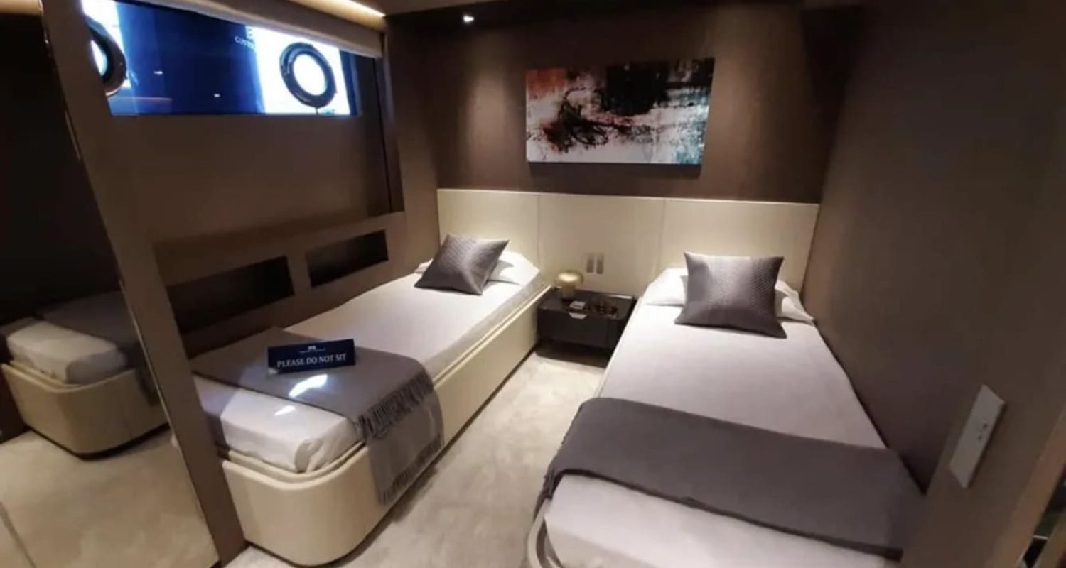 Double bedroom inside the 106' CUSTOM LINE yacht, providing comfort and elegance.