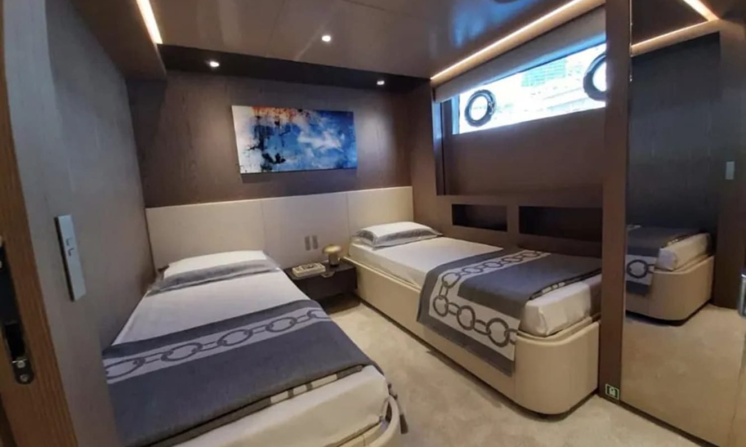 Another angle of the double bedroom aboard the 106' CUSTOM LINE yacht, emphasizing the luxury design.