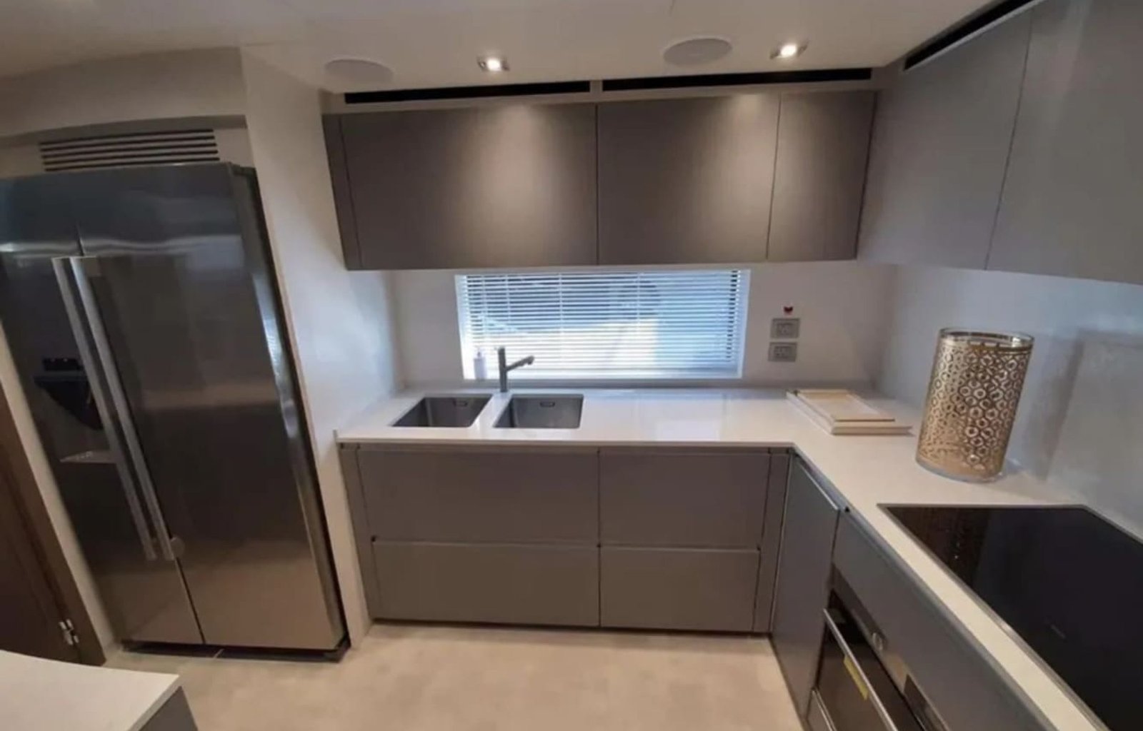 Modern and luxurious kitchen aboard, featuring high-end appliances and design.