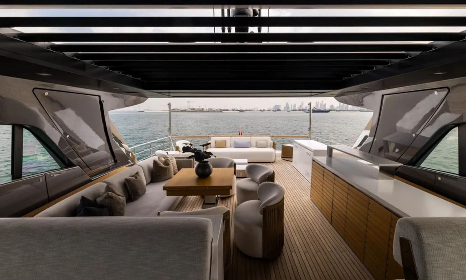 Miami 26 Luxurious seating area on the upper deck of the 88' Sanlorenzo yacht.