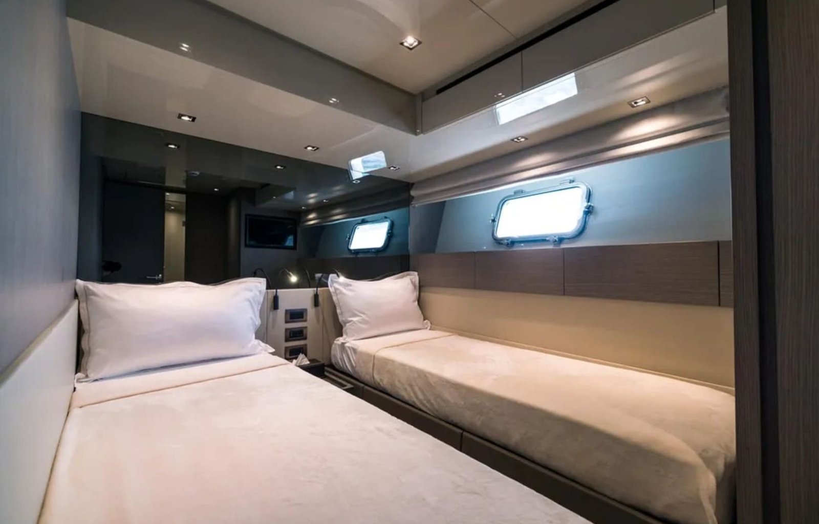 Comfortable twin guest cabin aboard the yacht.