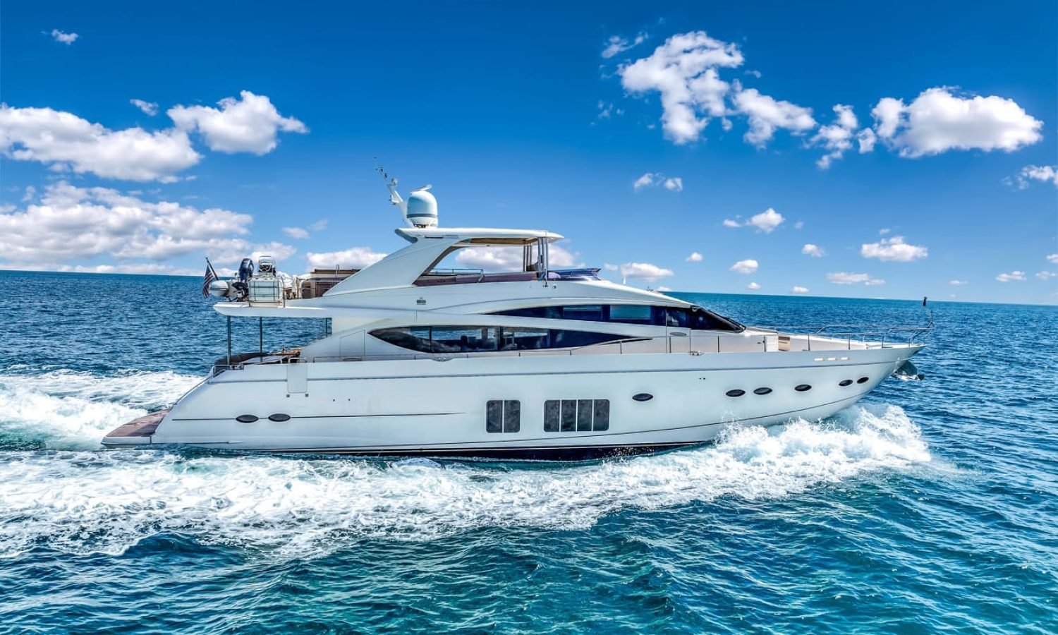 Full exterior view of the 88' PRINCESS luxury yacht, showcasing its sleek design and spacious decks.