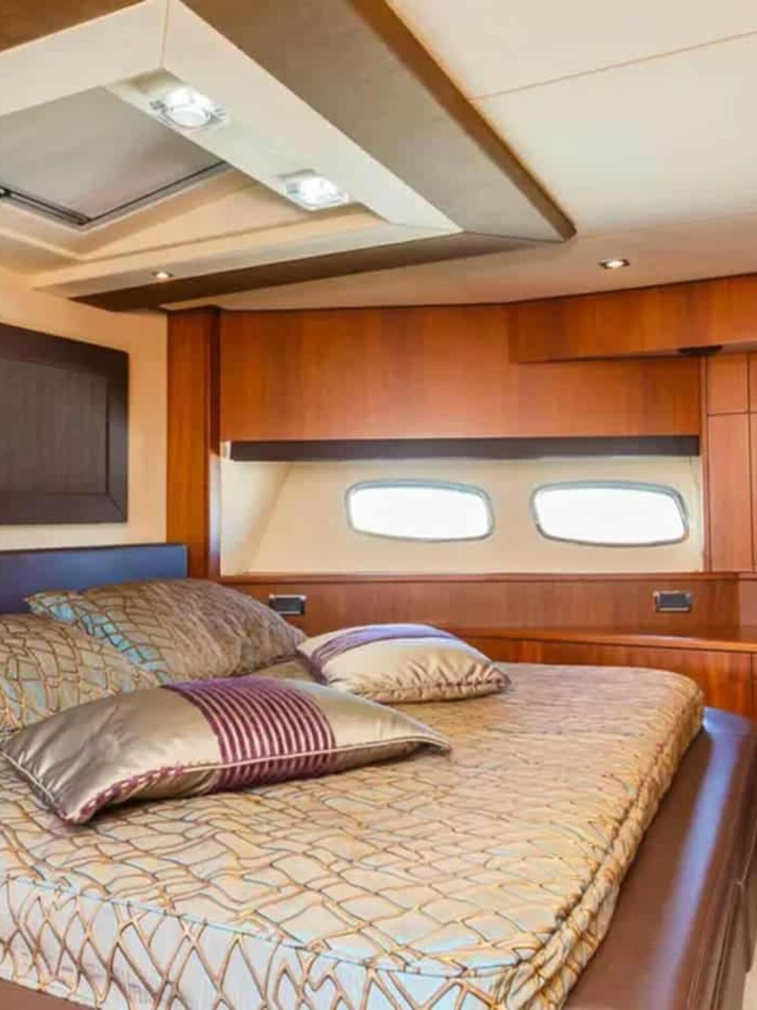 The VIP stateroom aboard the 88' Sunseeker yacht, offering premium comfort and sophisticated style.