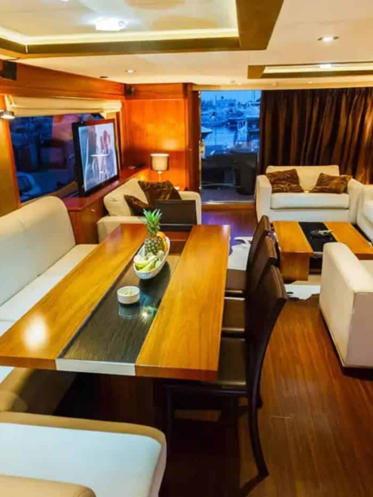 Beautifully designed interior of the yacht, featuring modern furnishings and an open layout.