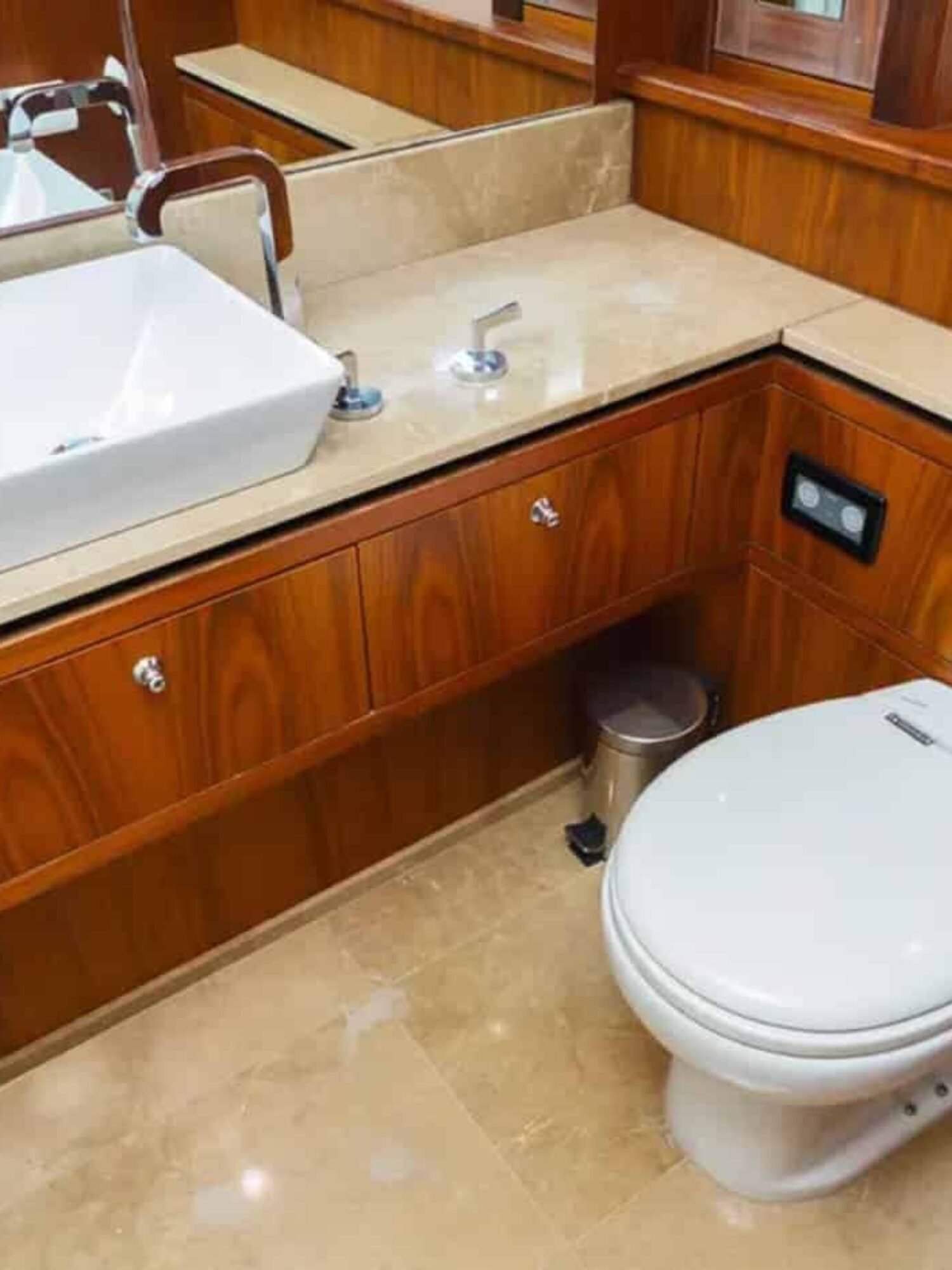 Stylish en-suite bathroom aboard the 88' Sunseeker yacht, featuring modern finishes and high-end amenities.