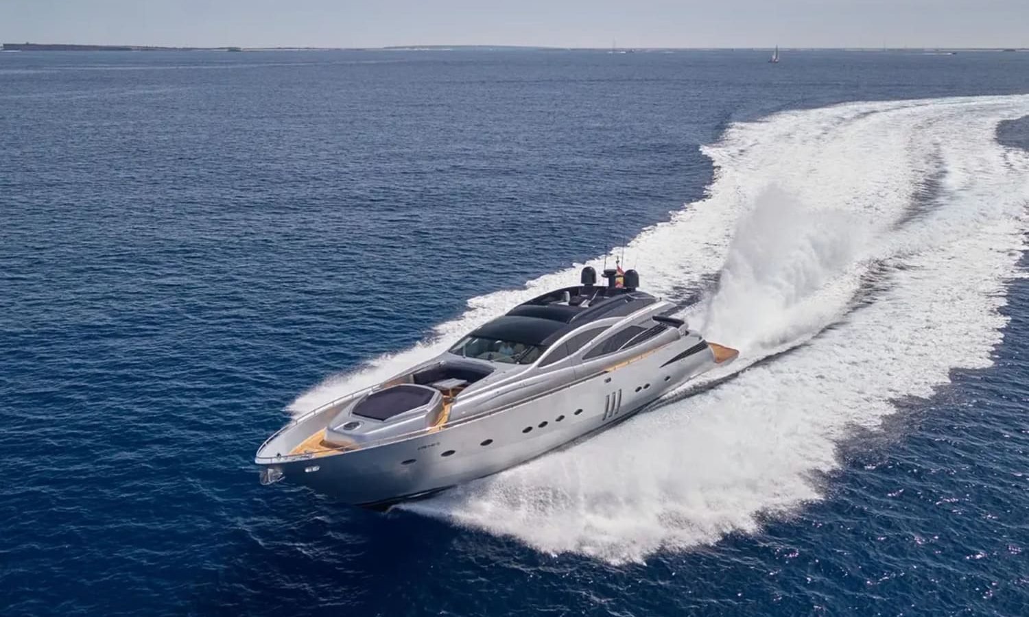 Ibiza 4 Stunning front view of the 90' Pershing superyacht showcasing its sleek, modern design and luxurious appeal.