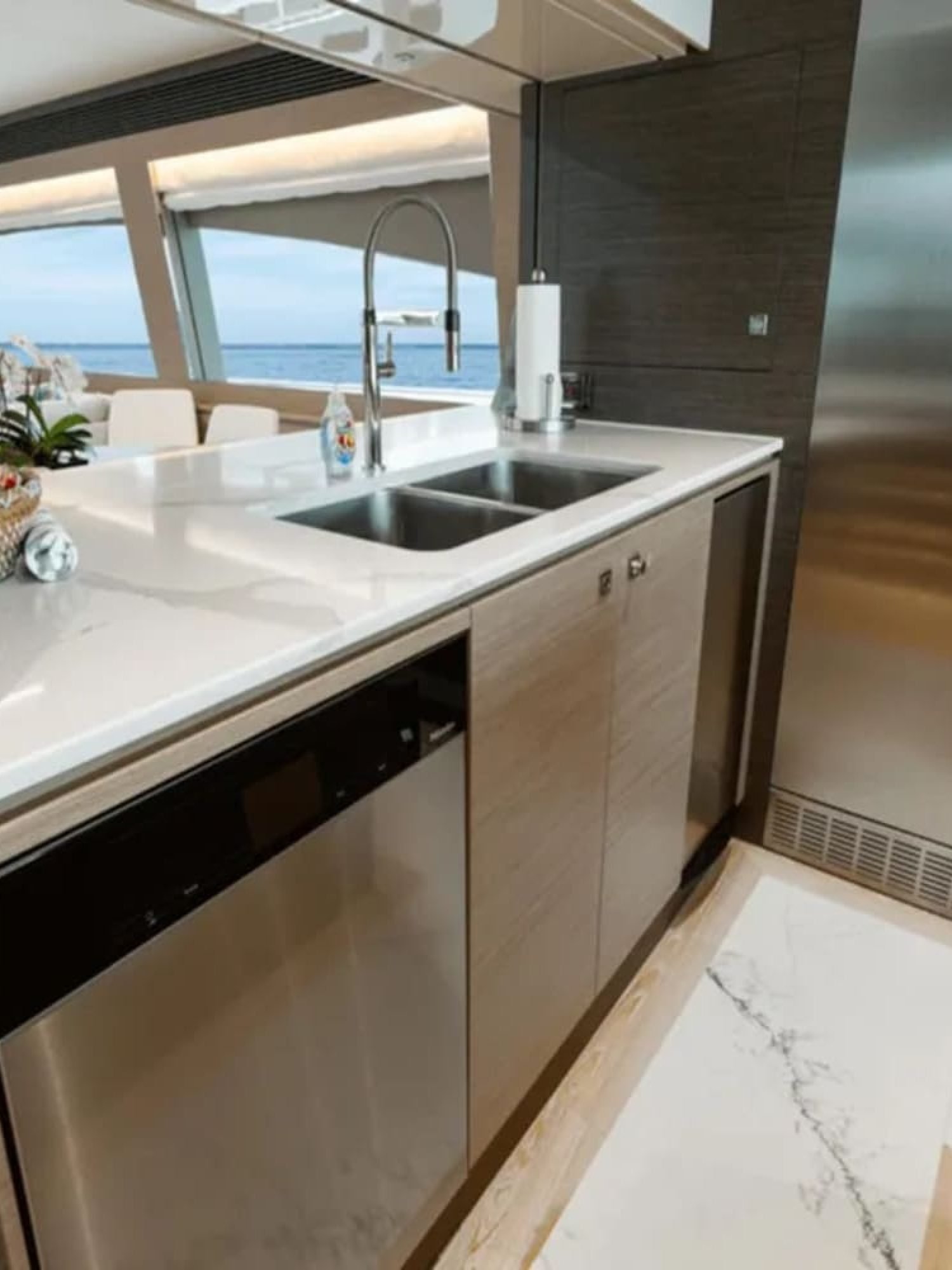 Cozy bedroom located on the lower deck of the 90' HORIZON yacht