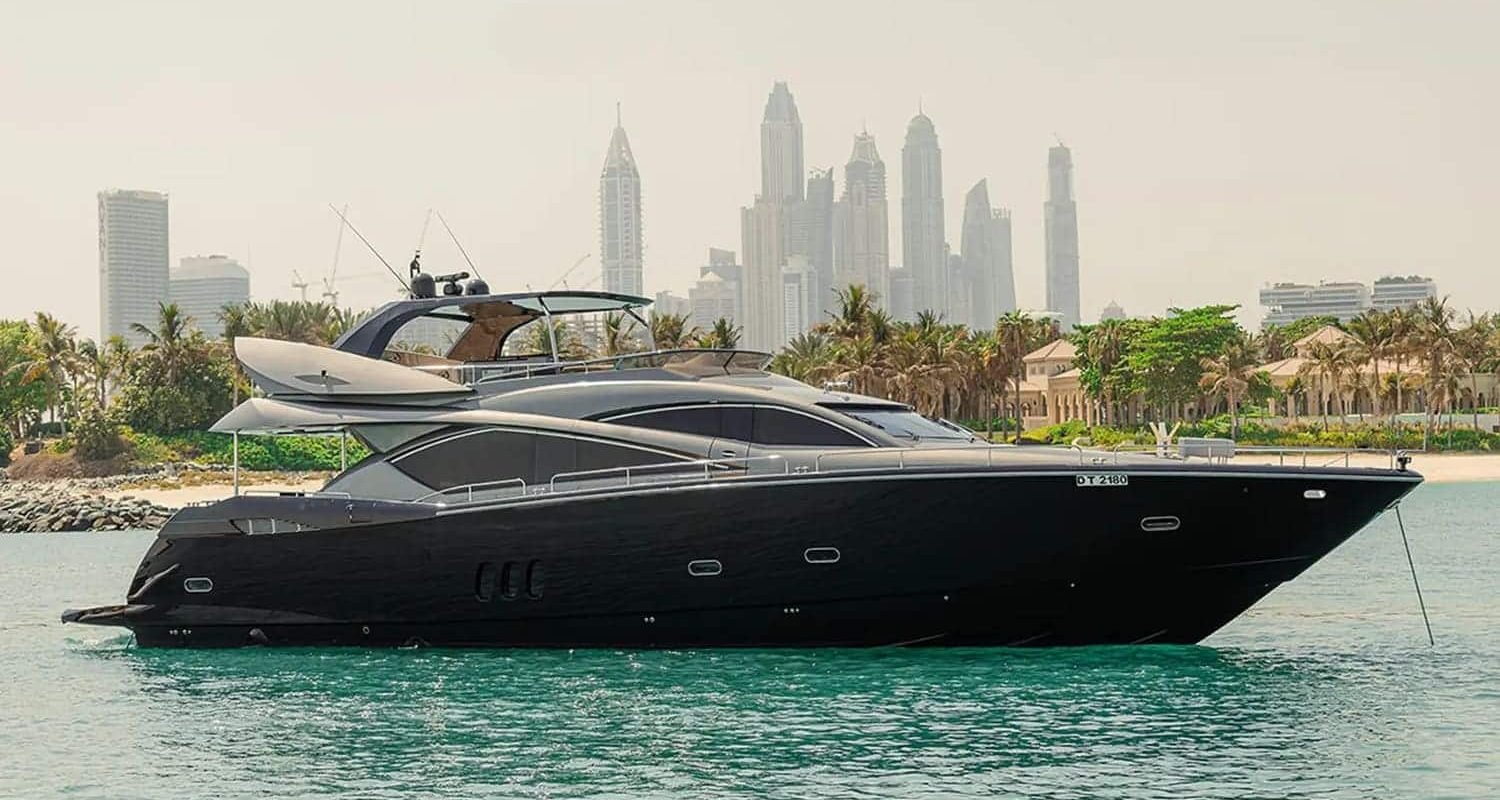 Side view of the 82' Sunseeker luxury yacht, showcasing its sleek and elegant design.