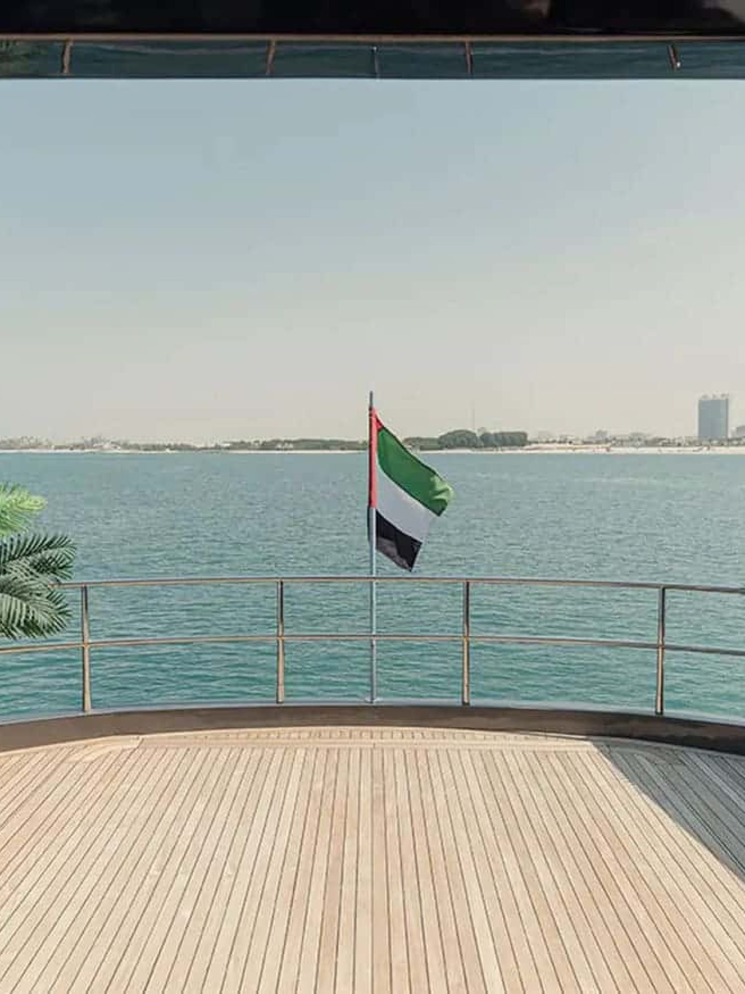 Spacious salon of the 82' Sunseeker yacht with panoramic windows and refined décor.