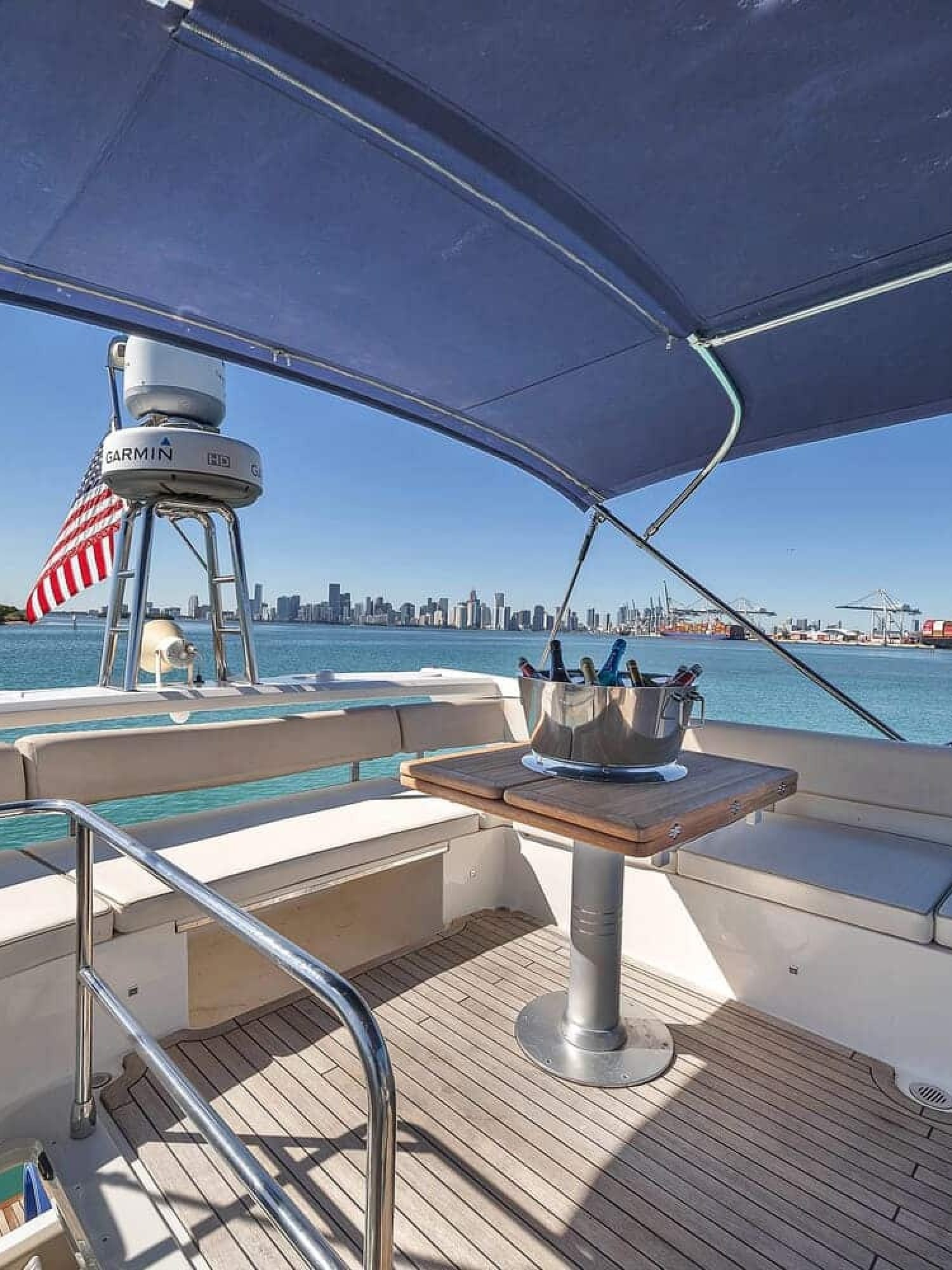A spacious and open interior view of the 60' ABSOLUTE FLY yacht, highlighting its luxurious design.