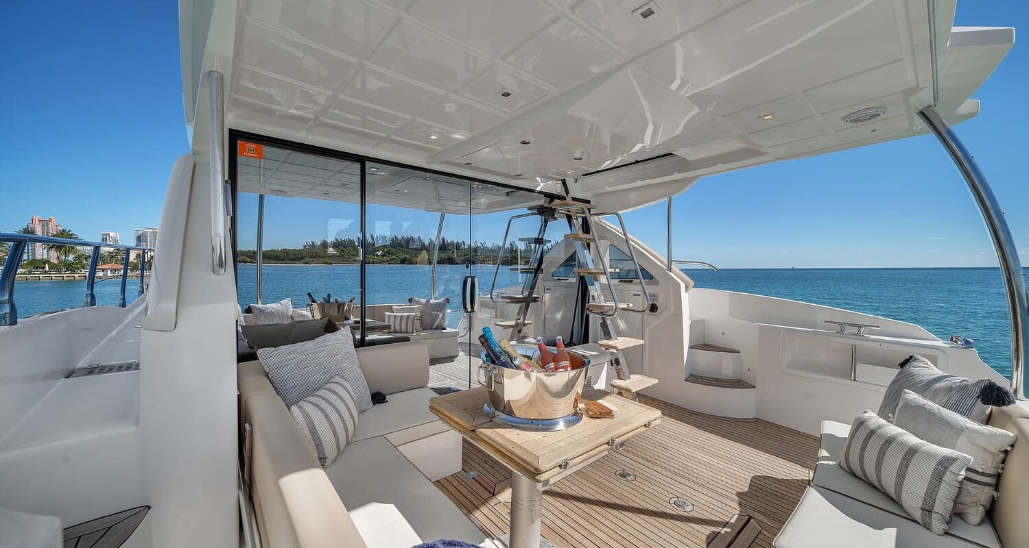 Interior shot of the 60' ABSOLUTE FLY yacht showing the stylish lounge area with high-end furniture