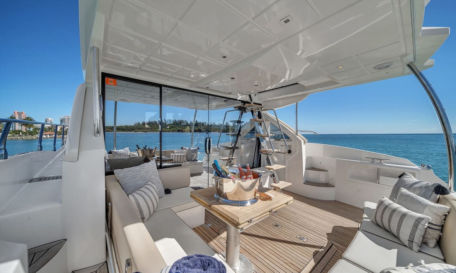 Interior shot of the 60' ABSOLUTE FLY yacht showing the stylish lounge area with high-end furniture