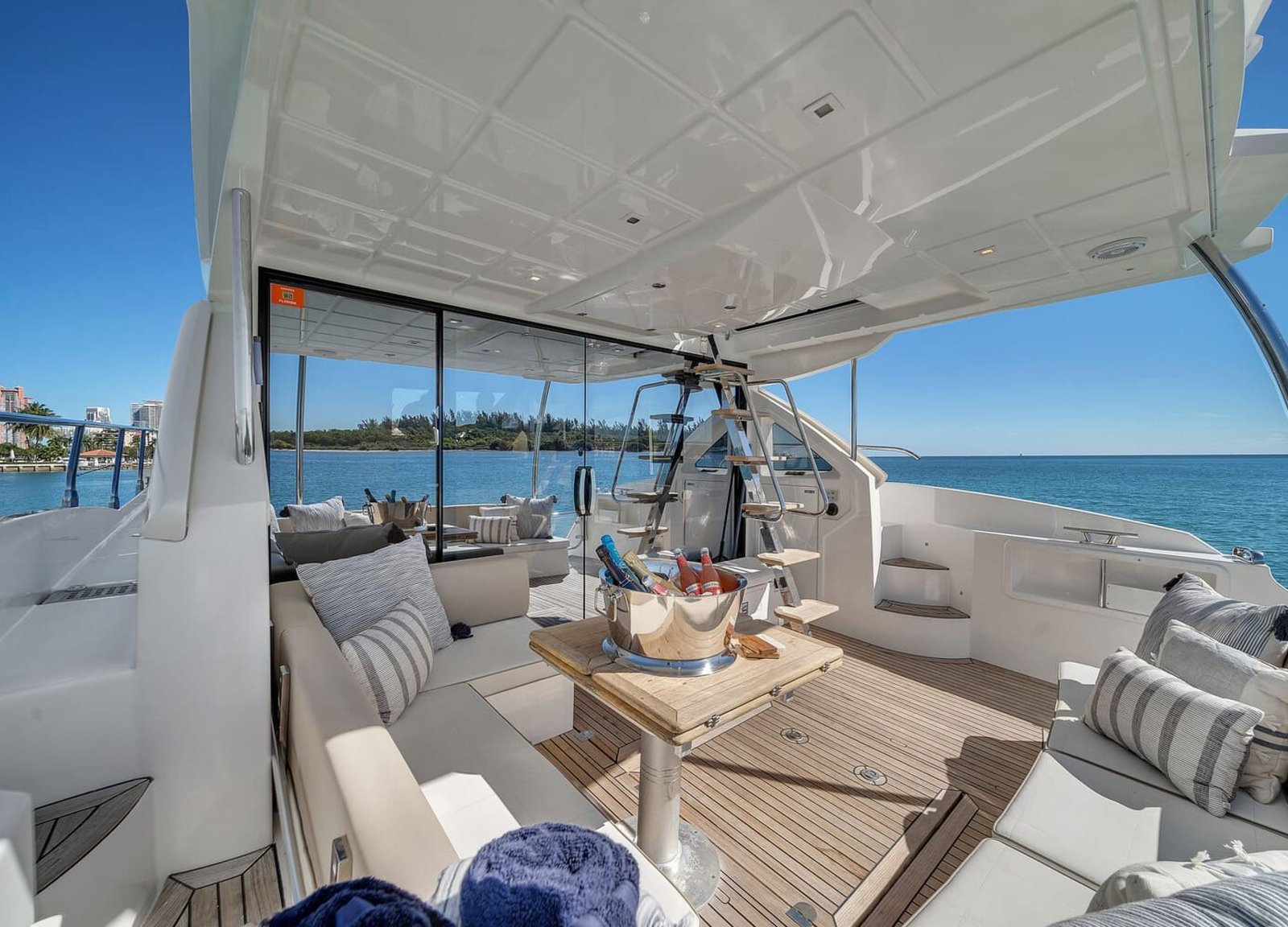 Interior shot of the 60' ABSOLUTE FLY yacht showing the stylish lounge area with high-end furniture