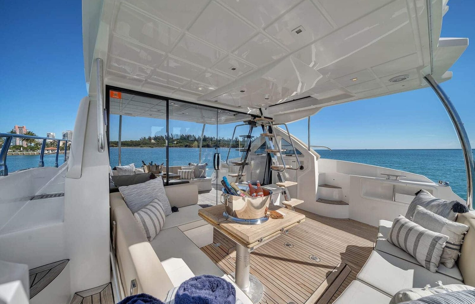 Interior shot of the 60' ABSOLUTE FLY yacht showing the stylish lounge area with high-end furniture
