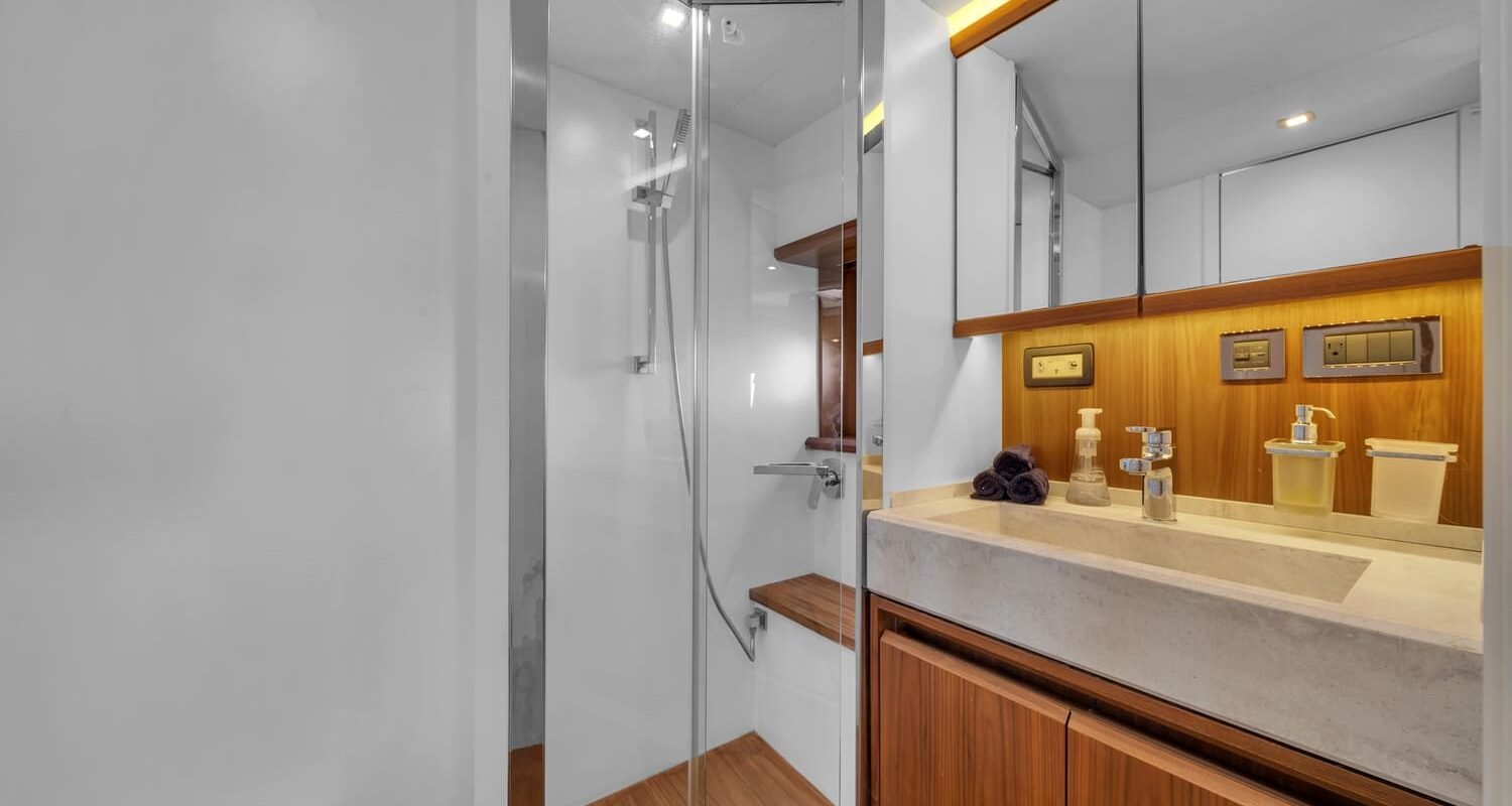 Elegant bathroom onboard the 60' ABSOLUTE FLY yacht with luxurious finishes and modern fixtures.