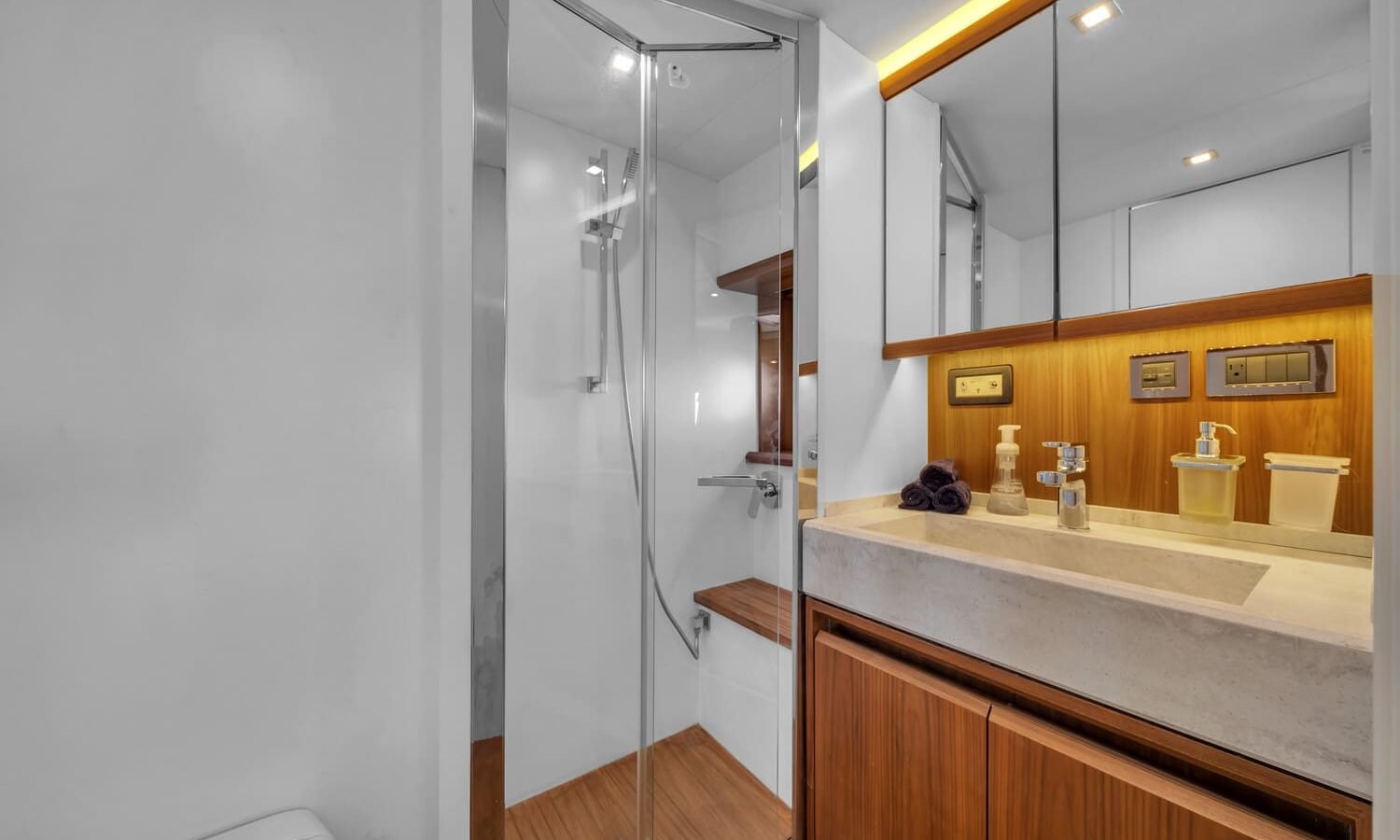 Elegant bathroom onboard the 60' ABSOLUTE FLY yacht with luxurious finishes and modern fixtures.