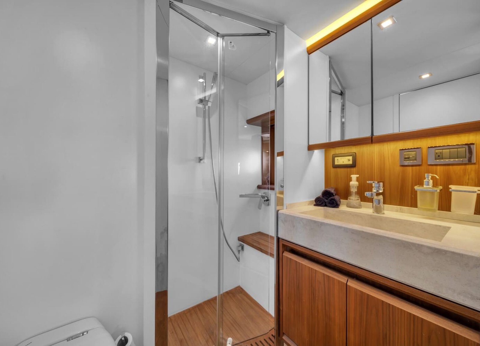 Elegant bathroom onboard the 60' ABSOLUTE FLY yacht with luxurious finishes and modern fixtures.