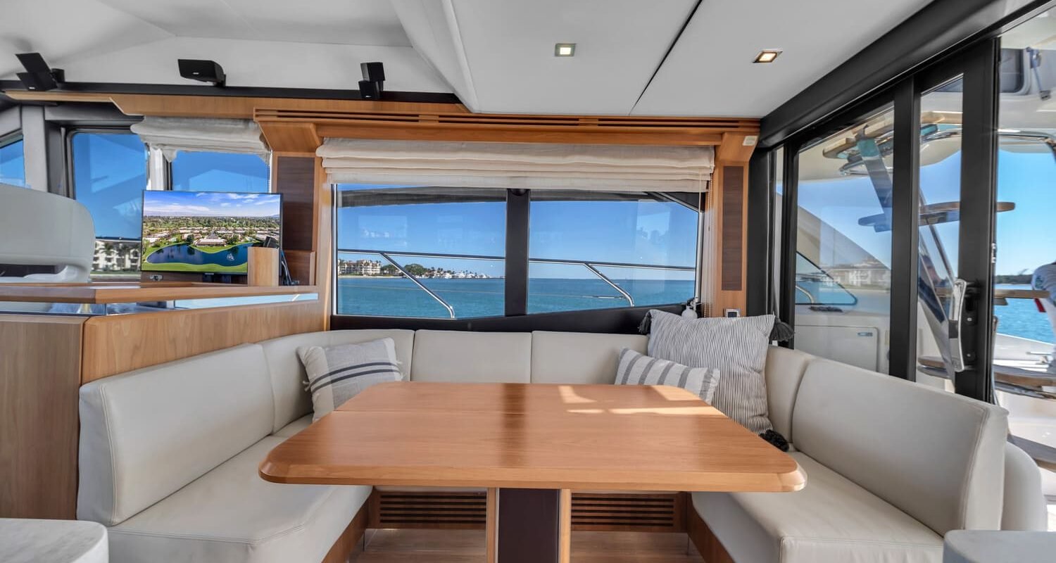 Dining area on the 60' ABSOLUTE FLY yacht, perfect for an elegant dining experience.