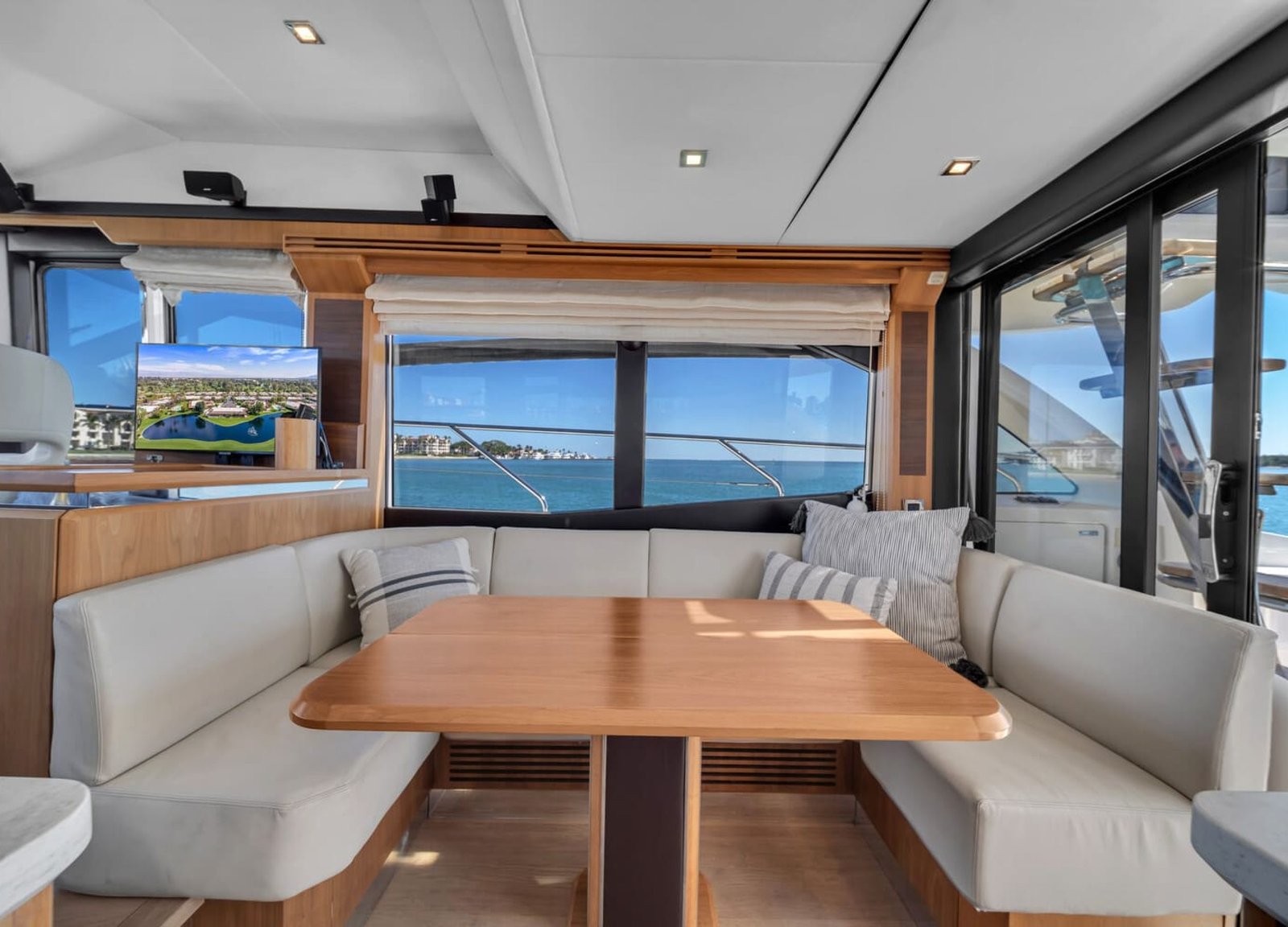 Dining area on the 60' ABSOLUTE FLY yacht, perfect for an elegant dining experience.