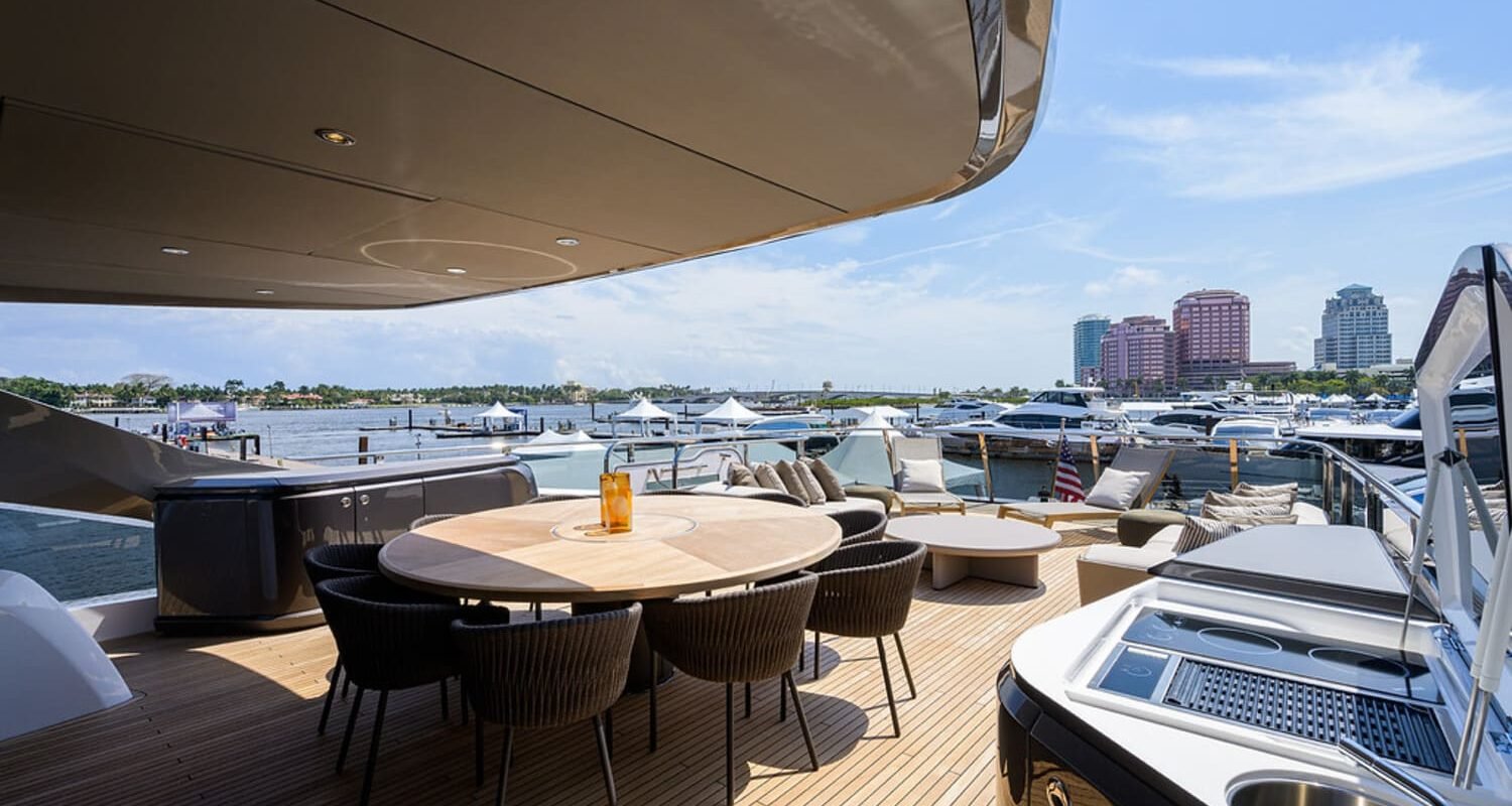 Spacious outdoor dining area on the 100' PRINCESS X95 yacht, perfect for enjoying the views and outdoor moments.