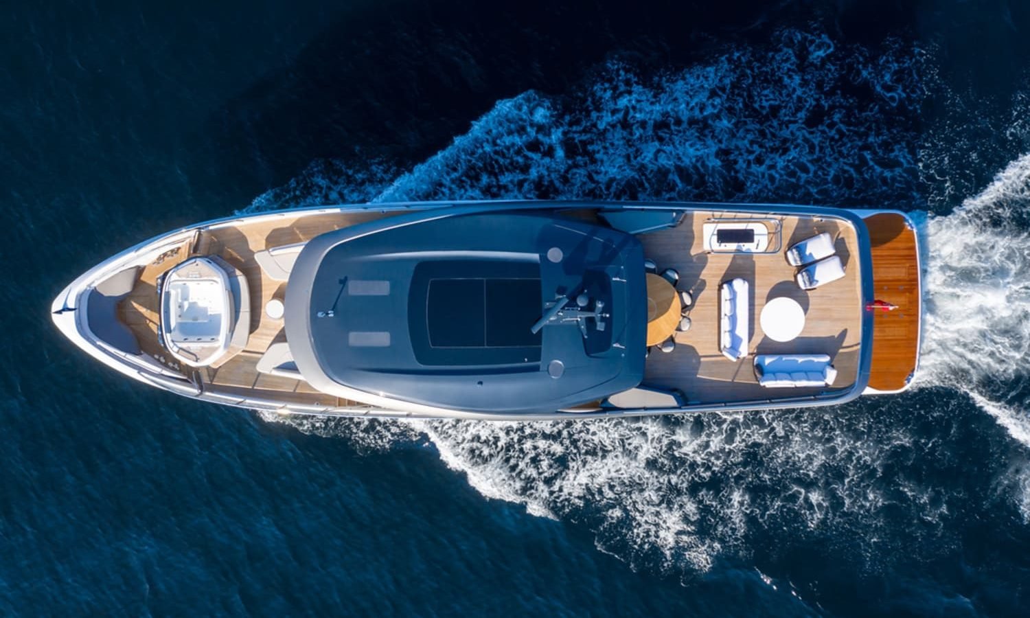 Stunning aerial view of the 100' PRINCESS X95 yacht displaying its sleek design.