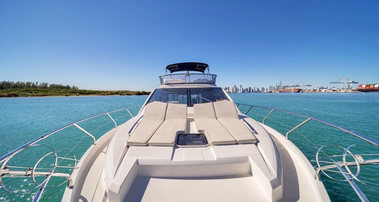 Front deck of the 60' ABSOLUTE FLY yacht, offering a perfect space for sunbathing and relaxation.