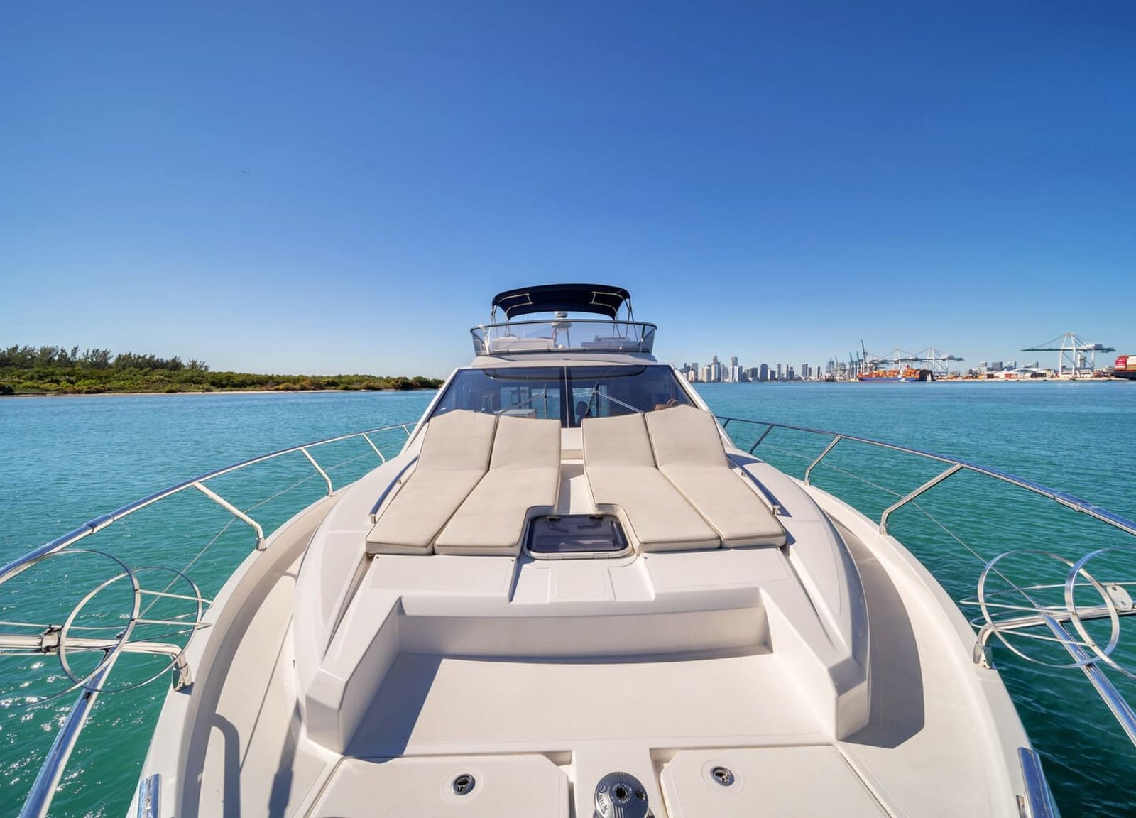 Front deck of the 60' ABSOLUTE FLY yacht, offering a perfect space for sunbathing and relaxation.