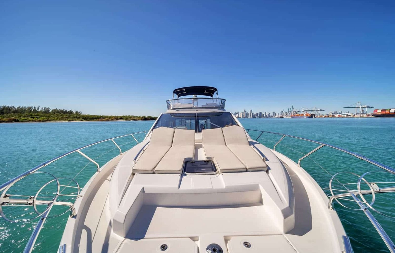 Front deck of the 60' ABSOLUTE FLY yacht, offering a perfect space for sunbathing and relaxation.