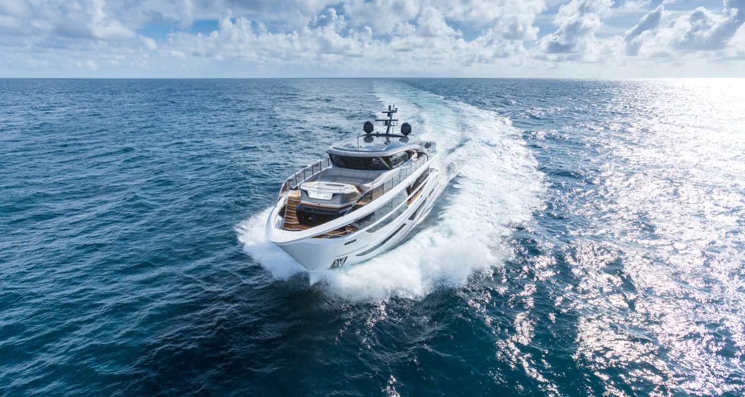 The 100' PRINCESS X95 yacht cruising at sea, showcasing its elegant exterior design.