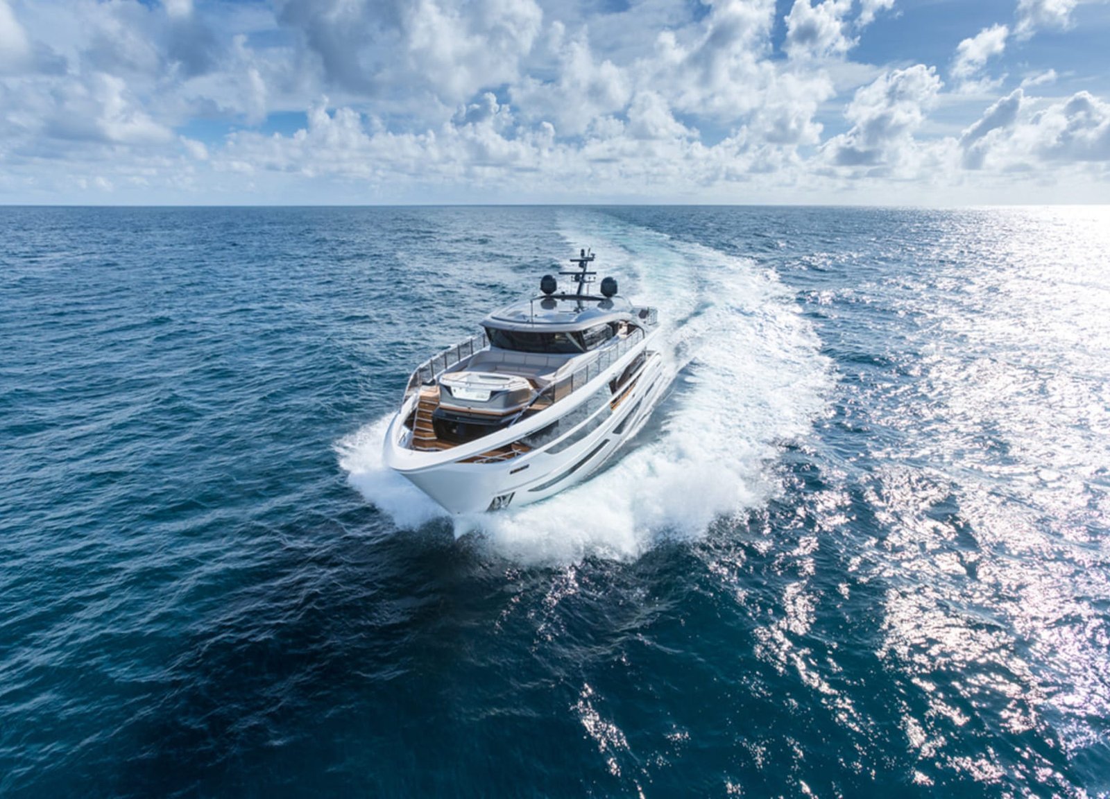 The 100' PRINCESS X95 yacht cruising at sea, showcasing its elegant exterior design.