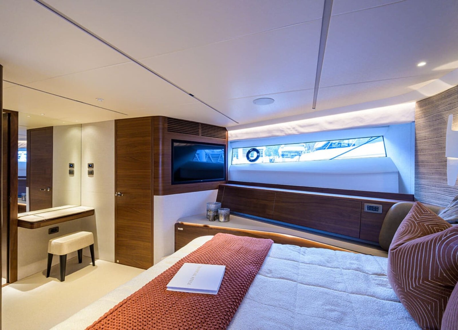 A serene view of the spacious bedroom on the 100' PRINCESS X95 yacht, designed for ultimate comfort.