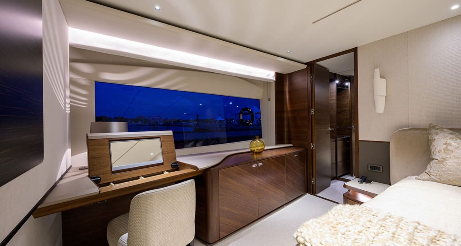 Stylish and comfortable seating area in one of the rooms on the 100' PRINCESS X95 yacht, perfect for relaxation.