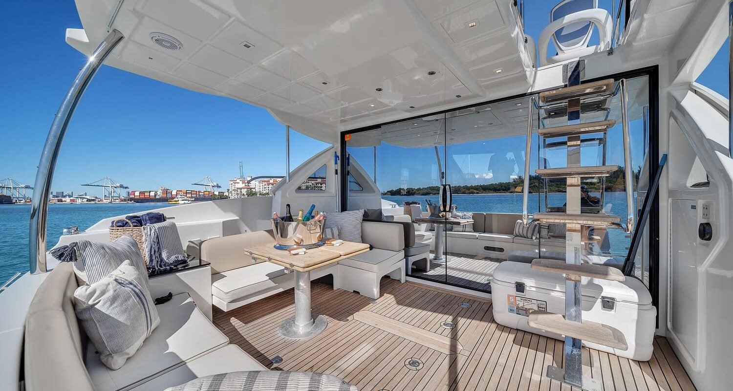 Interior area of the 60' ABSOLUTE FLY yacht, seamlessly blending with the outdoor space.