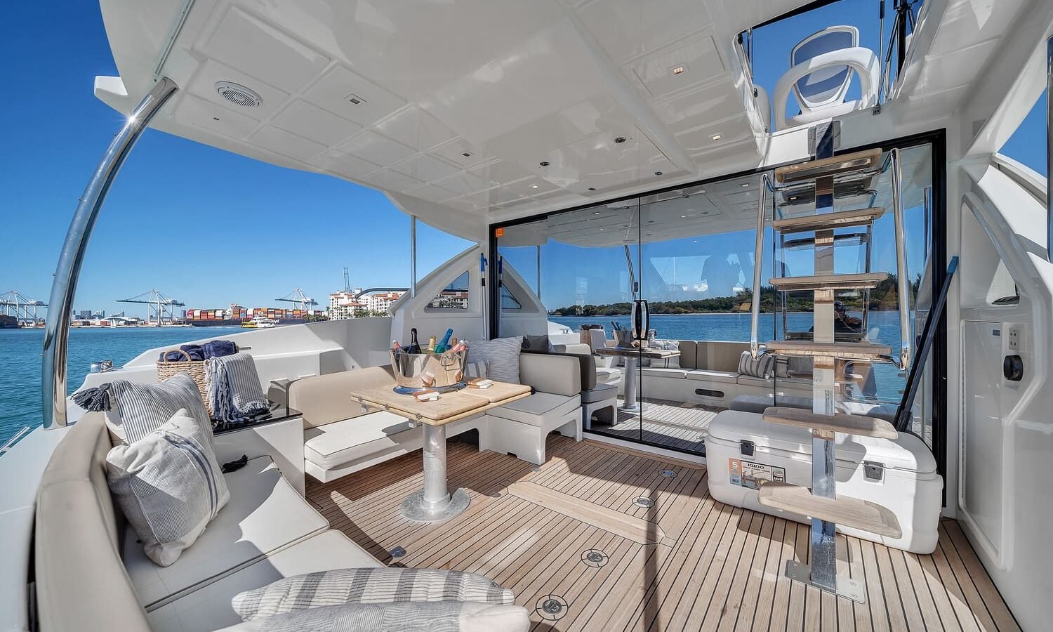 Interior area of the 60' ABSOLUTE FLY yacht, seamlessly blending with the outdoor space.