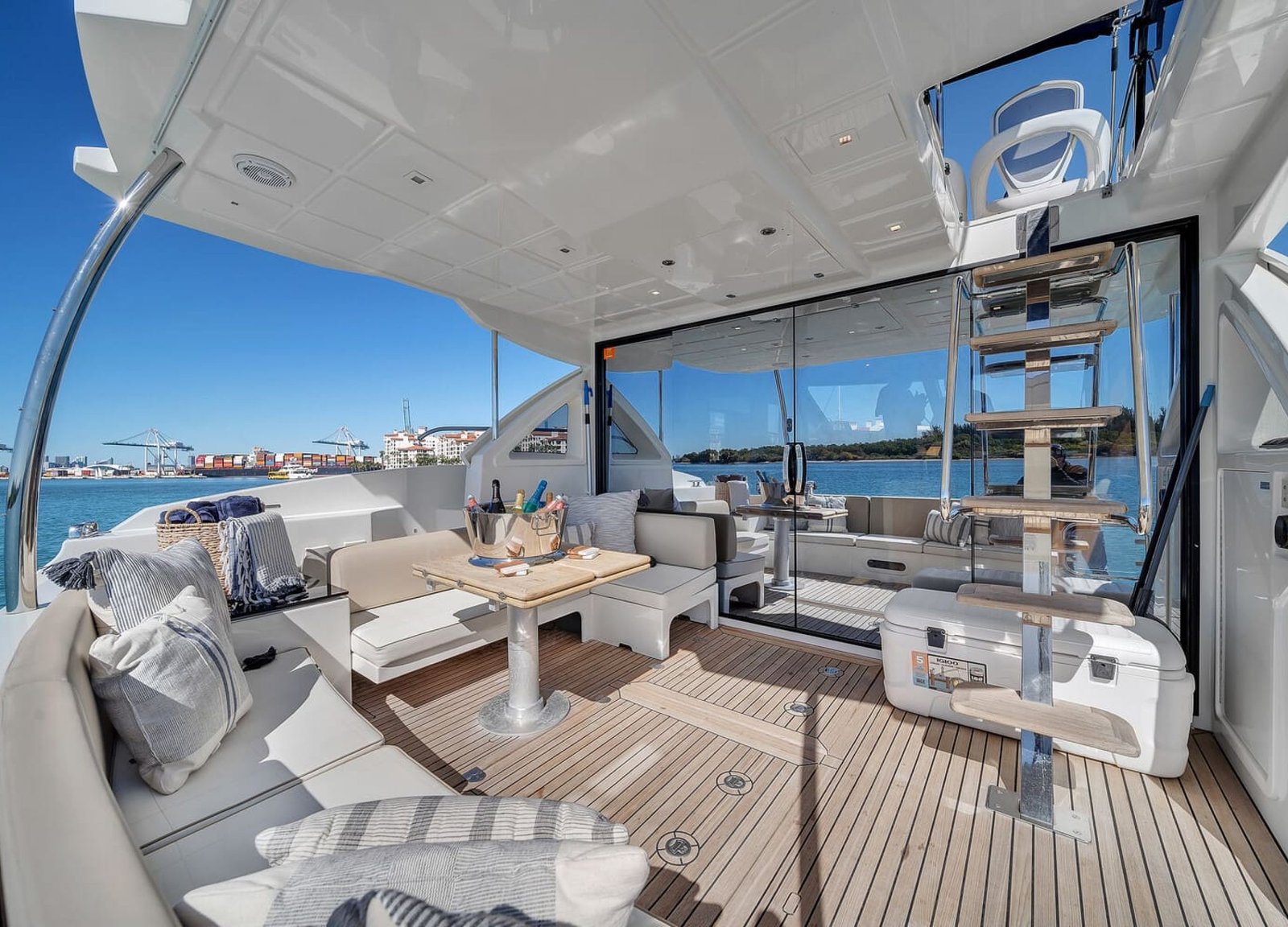 Interior area of the 60' ABSOLUTE FLY yacht, seamlessly blending with the outdoor space.