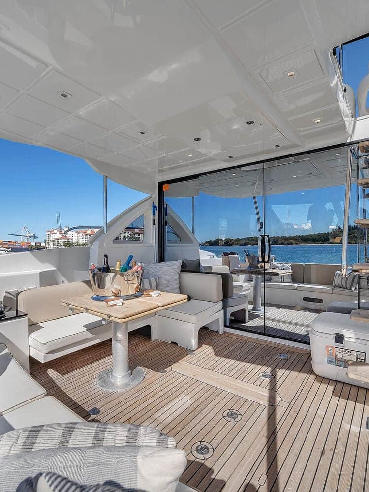 Interior area of the 60' ABSOLUTE FLY yacht, seamlessly blending with the outdoor space.