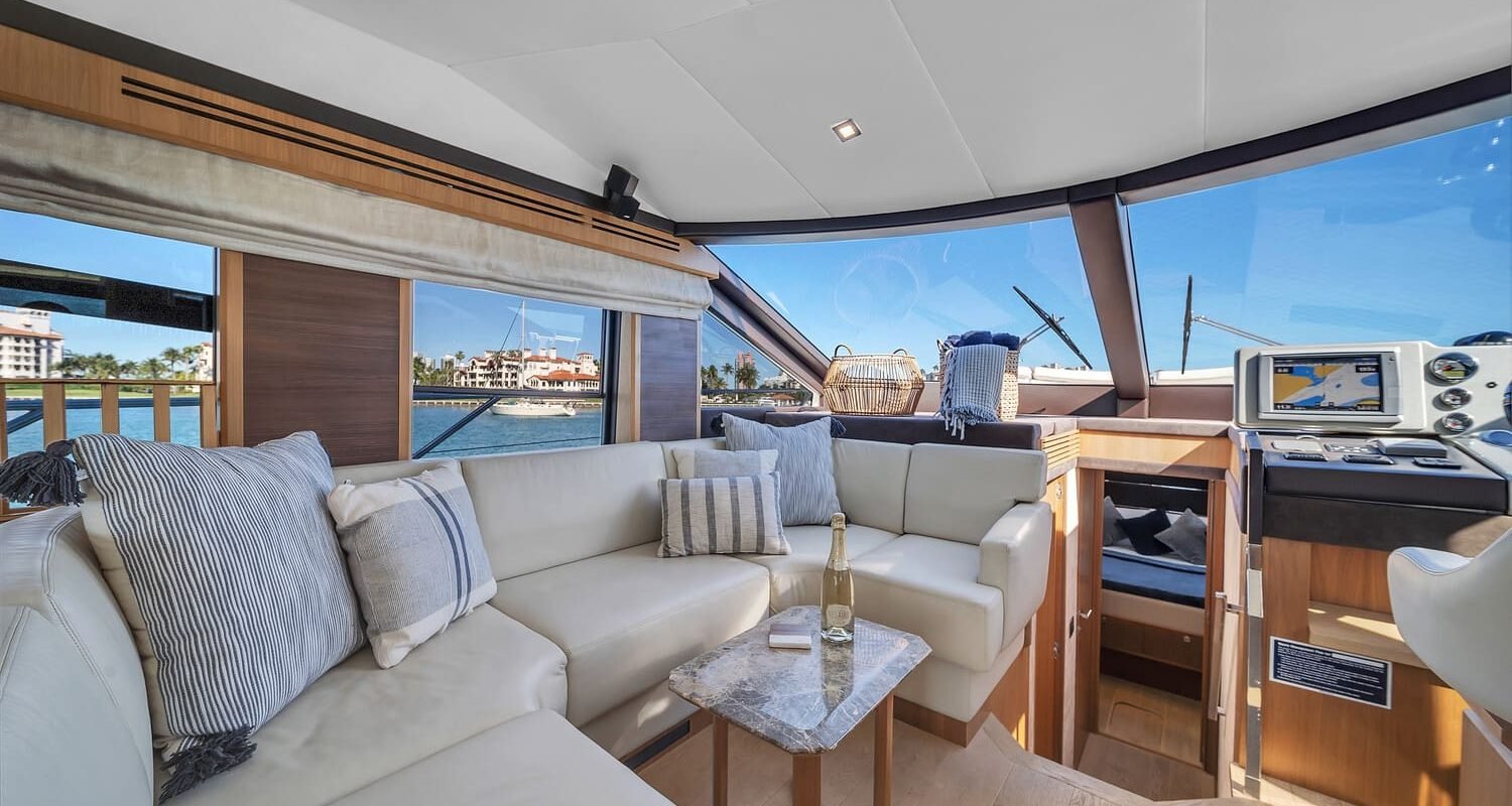 Cozy sitting area aboard the 60' ABSOLUTE FLY yacht, perfect for relaxation or entertaining guests.