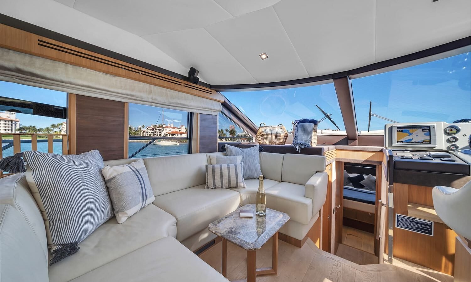 Cozy sitting area aboard the 60' ABSOLUTE FLY yacht, perfect for relaxation or entertaining guests.