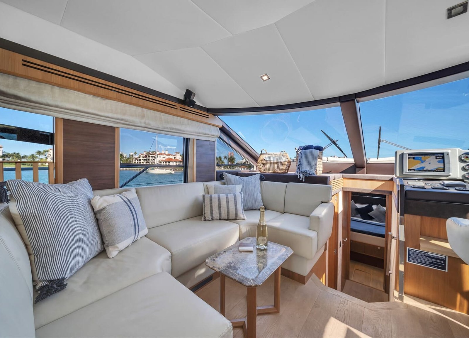 Cozy sitting area aboard the 60' ABSOLUTE FLY yacht, perfect for relaxation or entertaining guests.