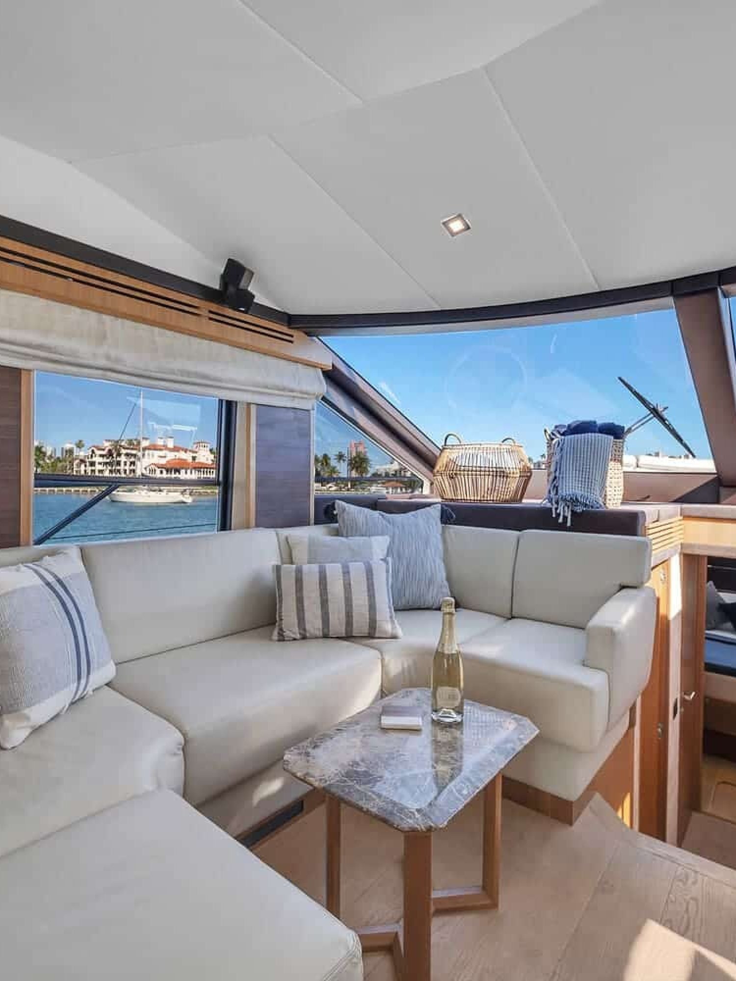 Cozy sitting area aboard the 60' ABSOLUTE FLY yacht, perfect for relaxation or entertaining guests.