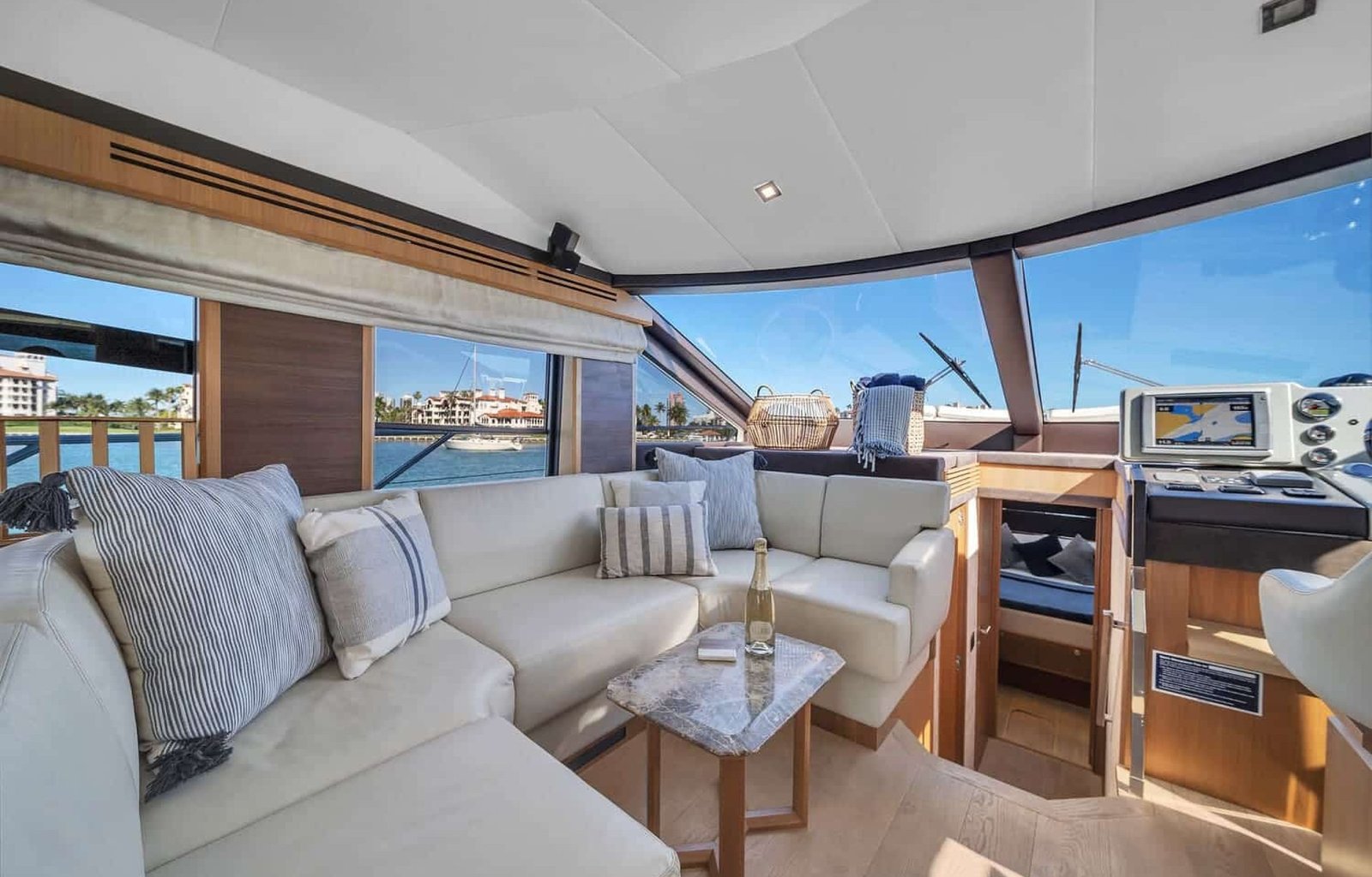Cozy sitting area aboard the 60' ABSOLUTE FLY yacht, perfect for relaxation or entertaining guests.