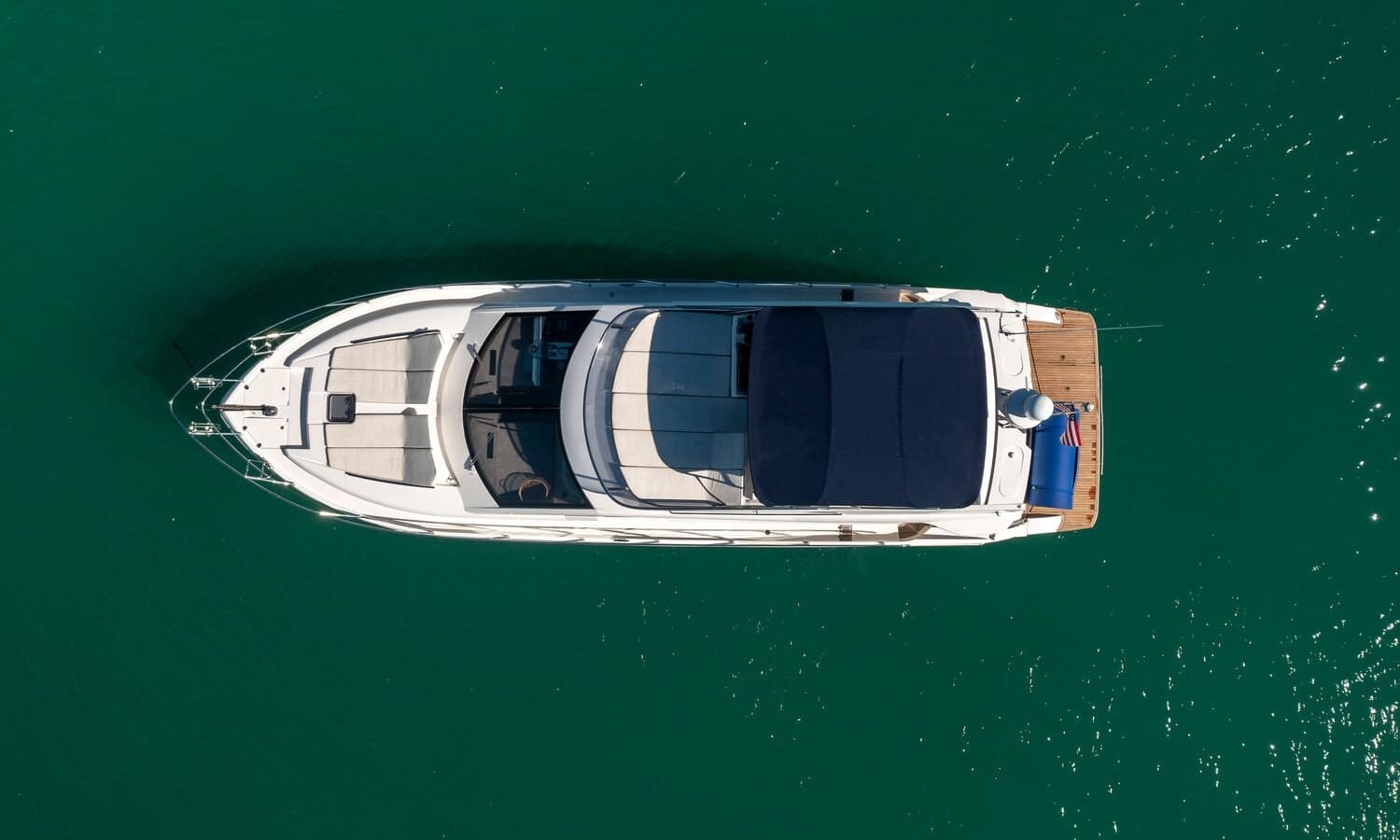 Aerial shot of the 60' ABSOLUTE FLY yacht, showcasing its top-down design and luxurious features.