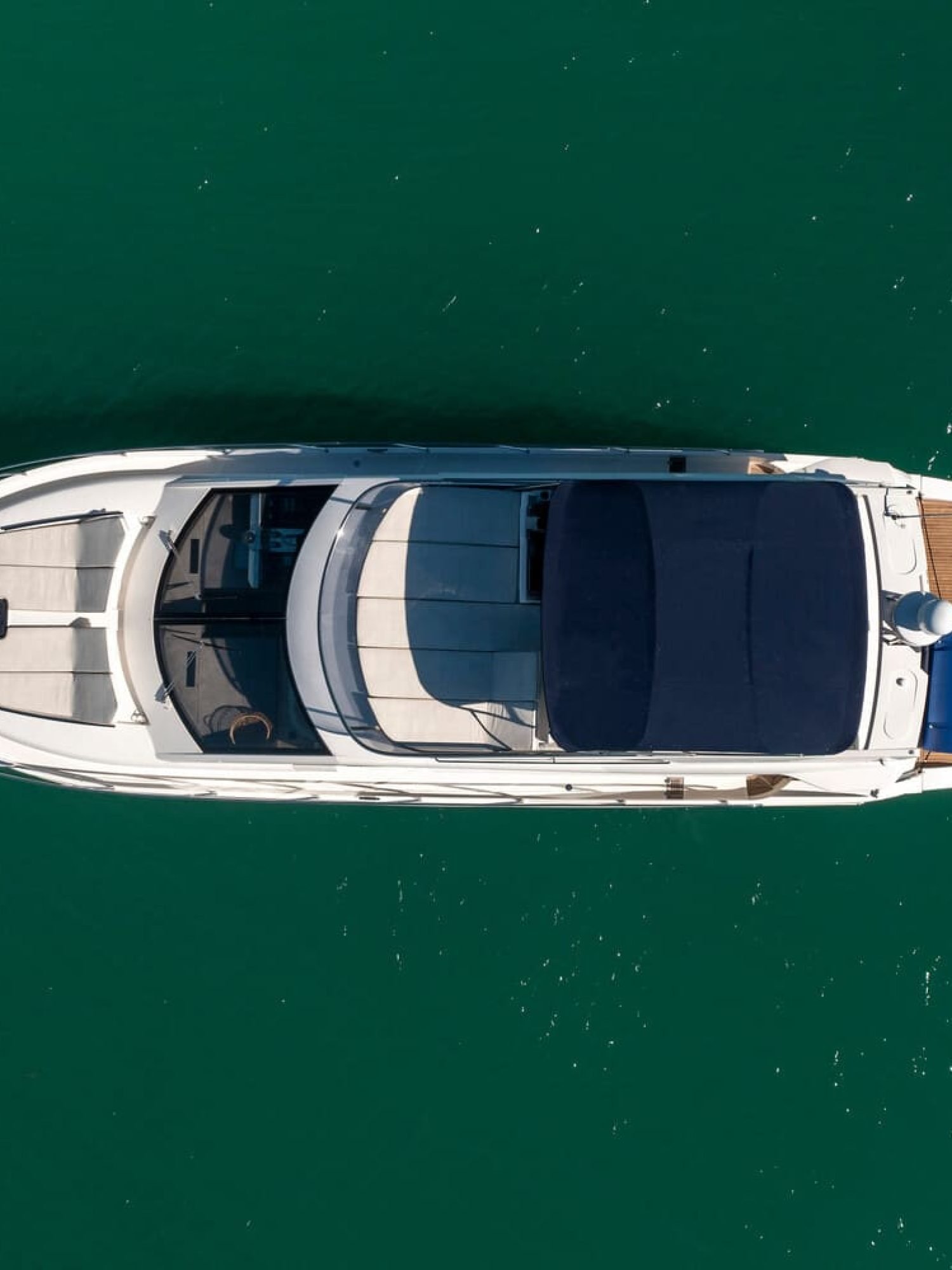 Aerial shot of the 60' ABSOLUTE FLY yacht, showcasing its top-down design and luxurious features.