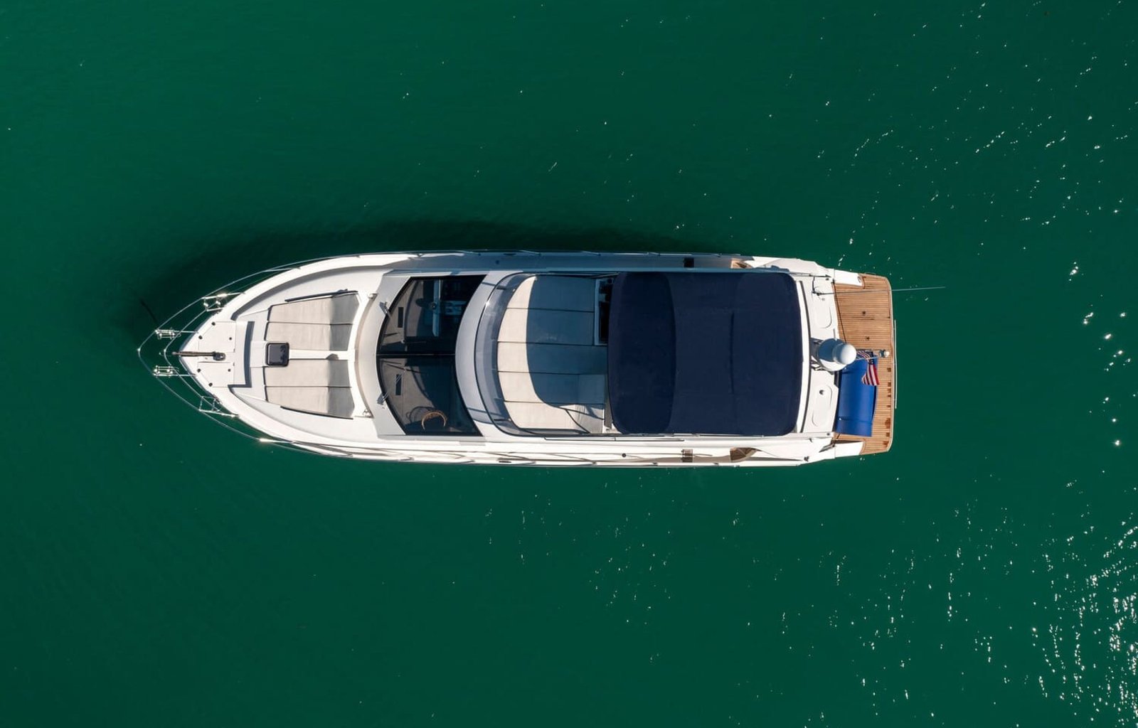 Aerial shot of the 60' ABSOLUTE FLY yacht, showcasing its top-down design and luxurious features.